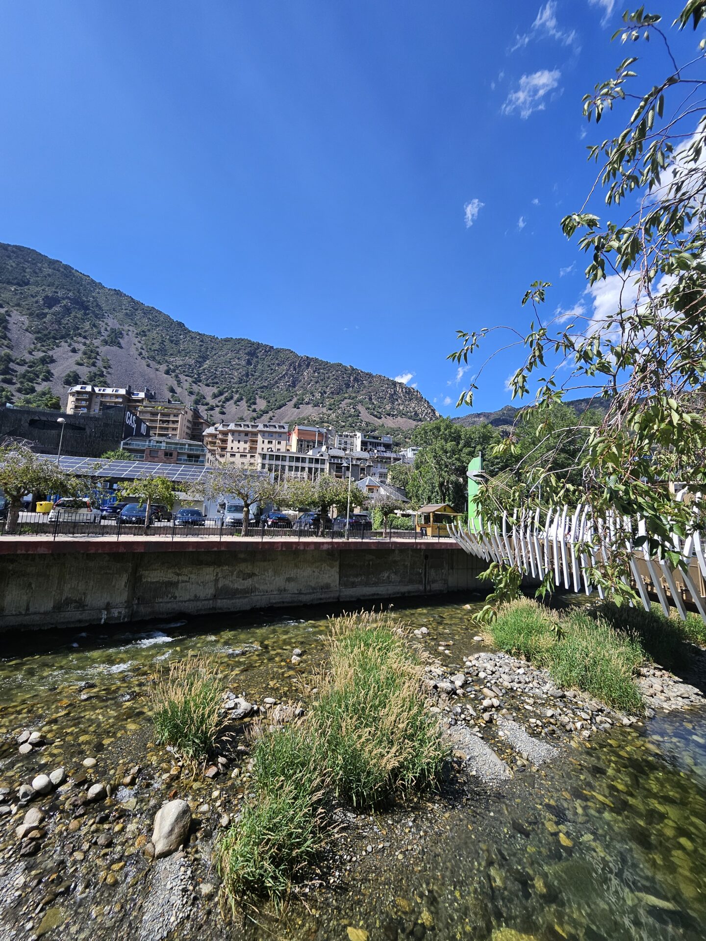 a river with a bridge over it