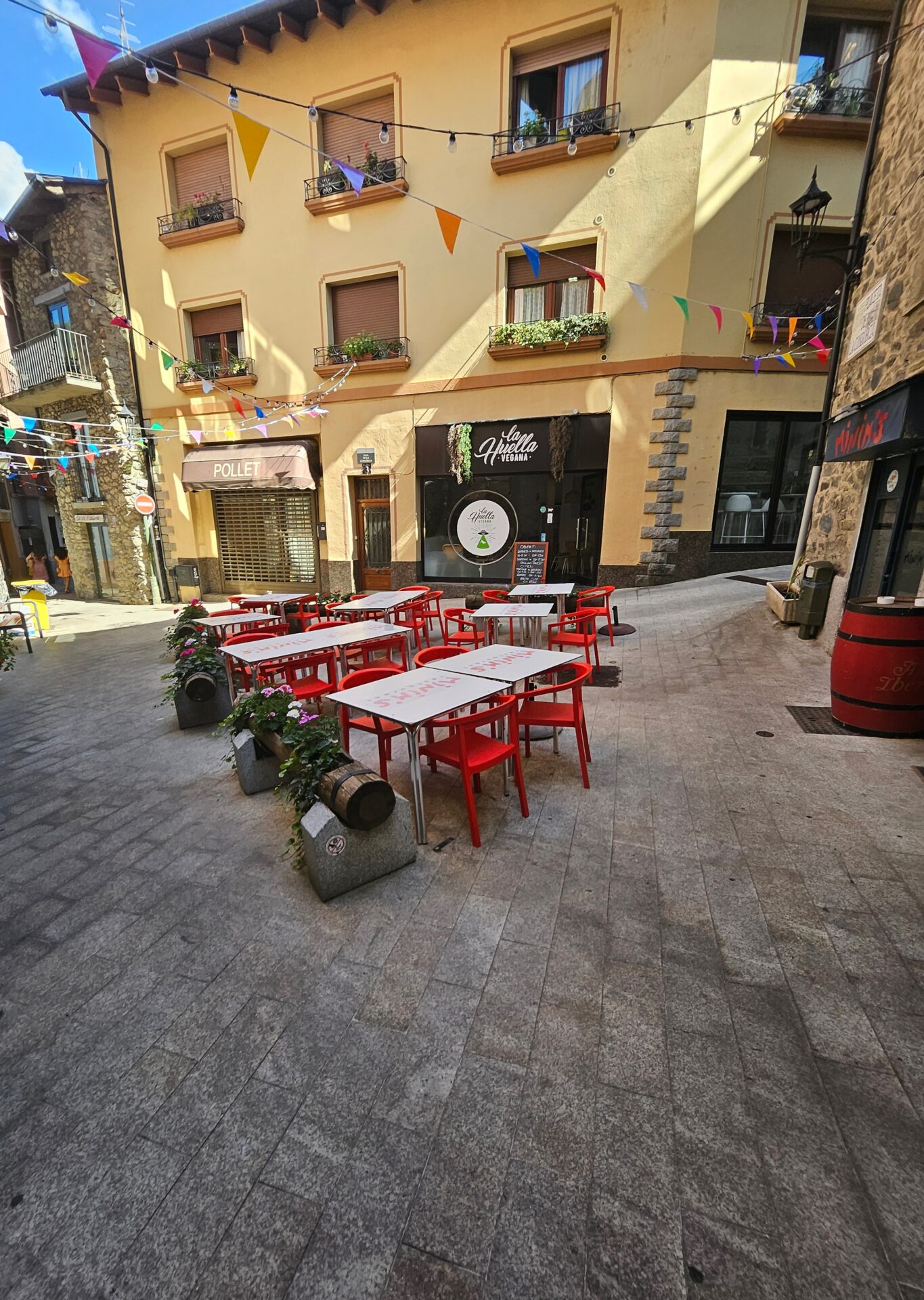 a street with tables and chairs