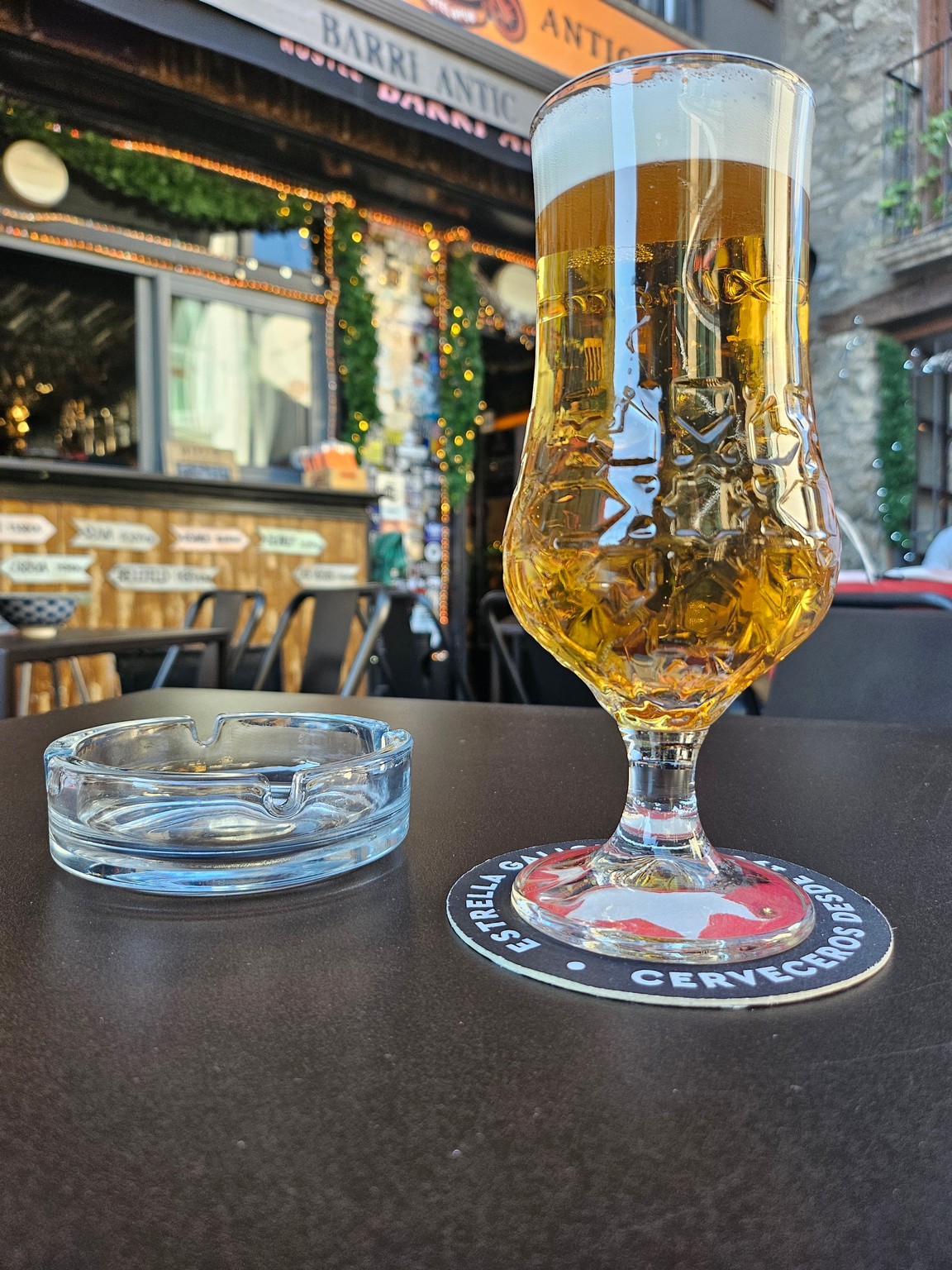 a glass of beer on a table