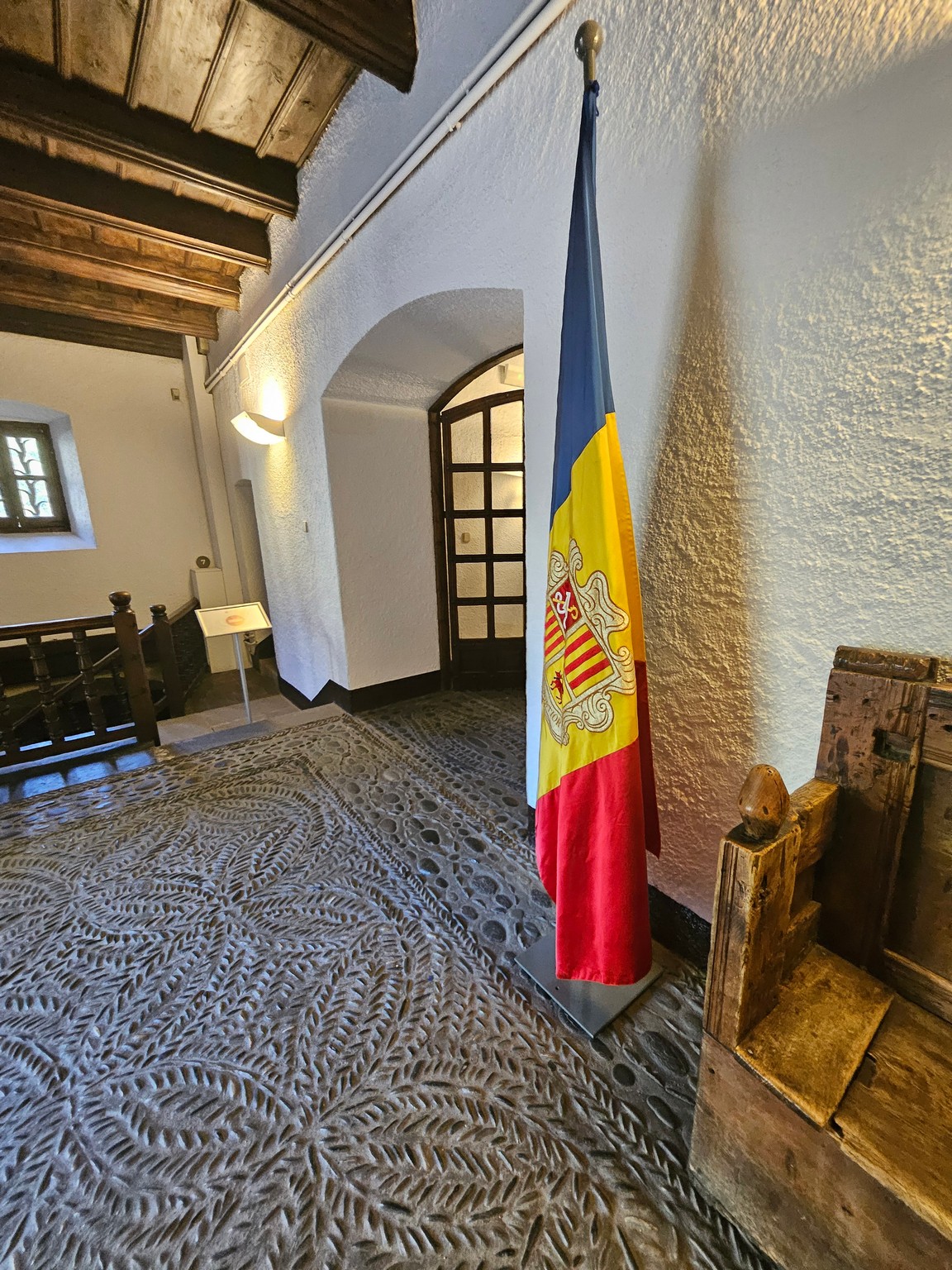 a flag on a stand in a room