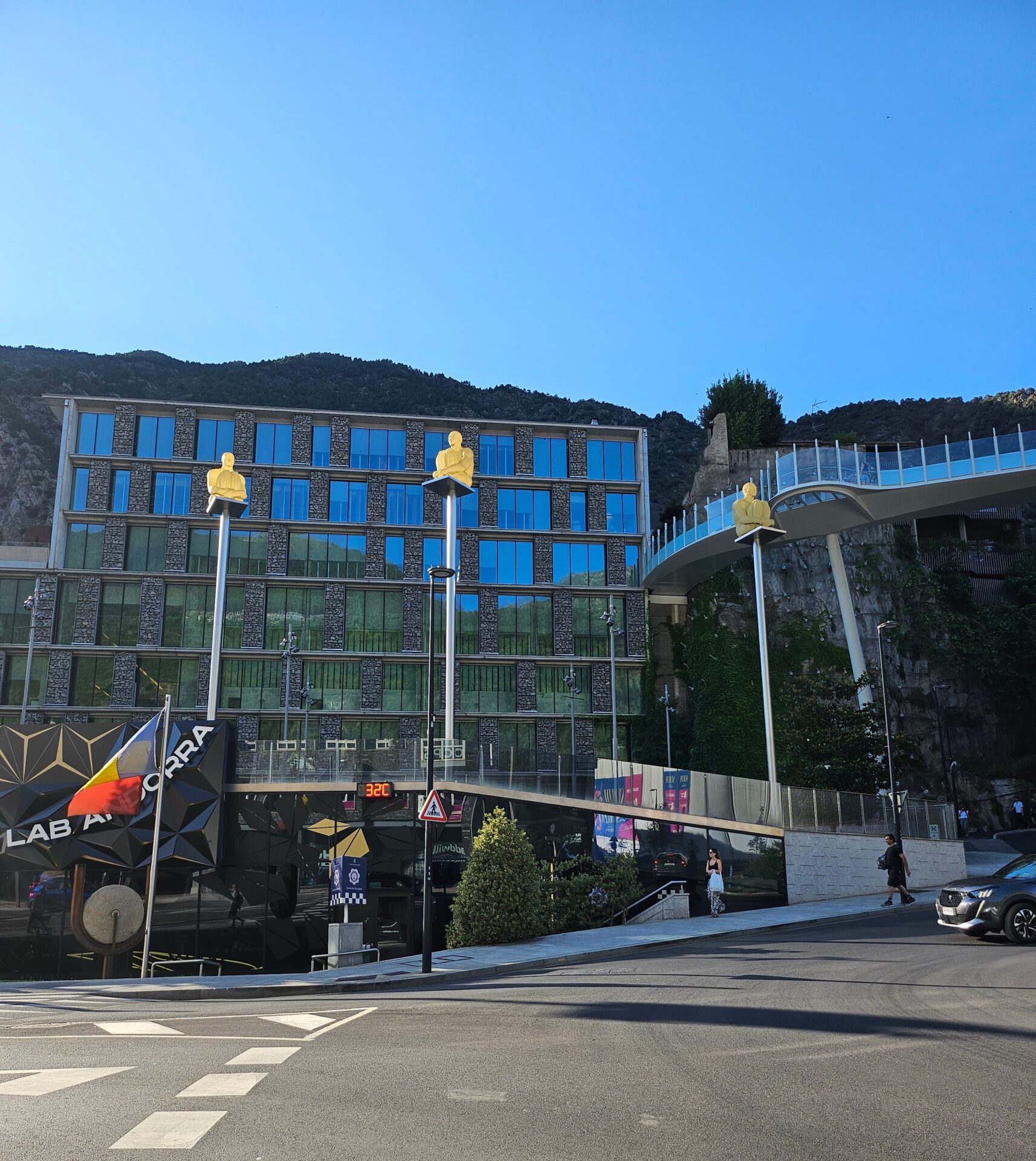 a building with a bridge over a road