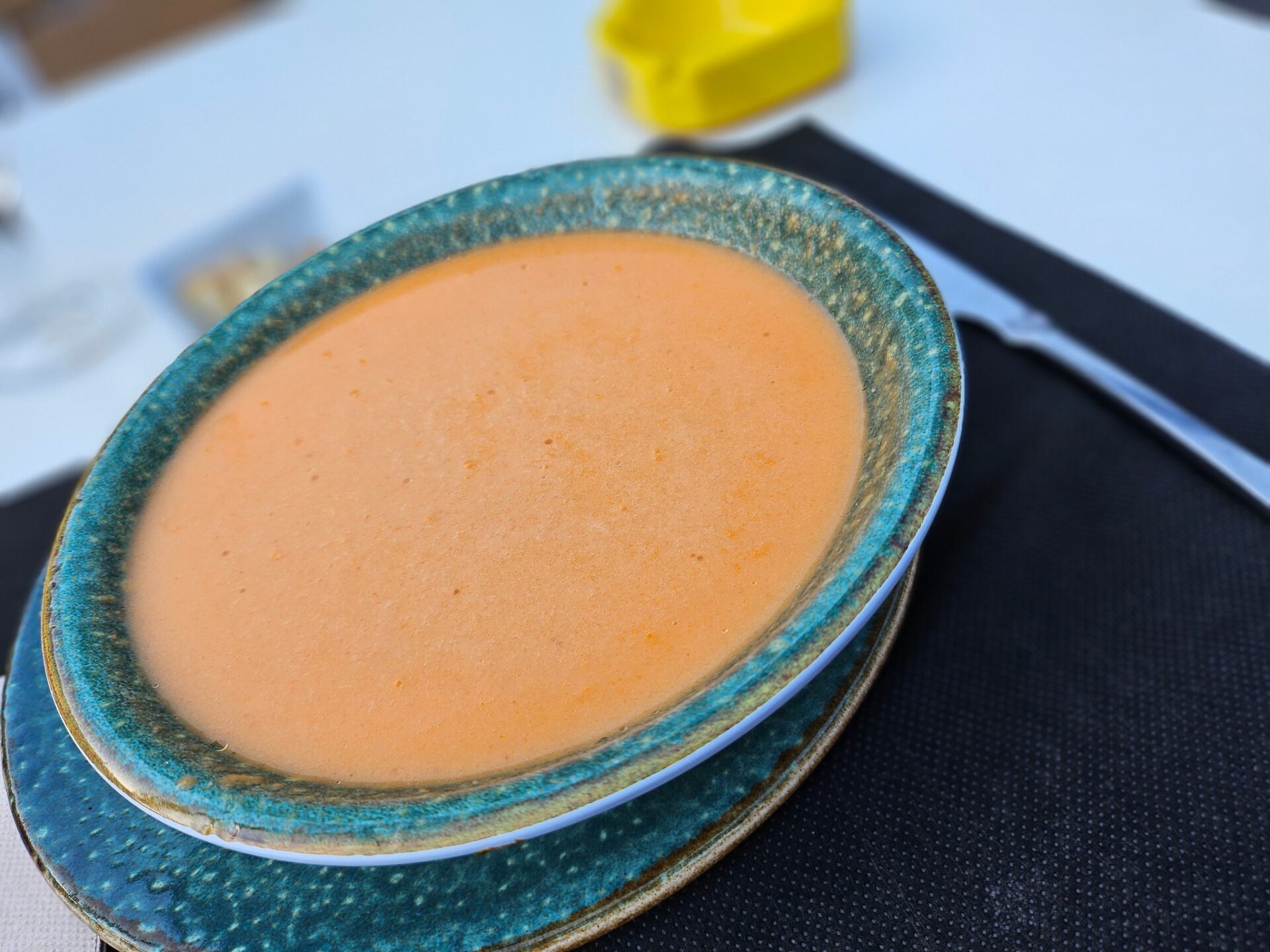 a bowl of soup on a table