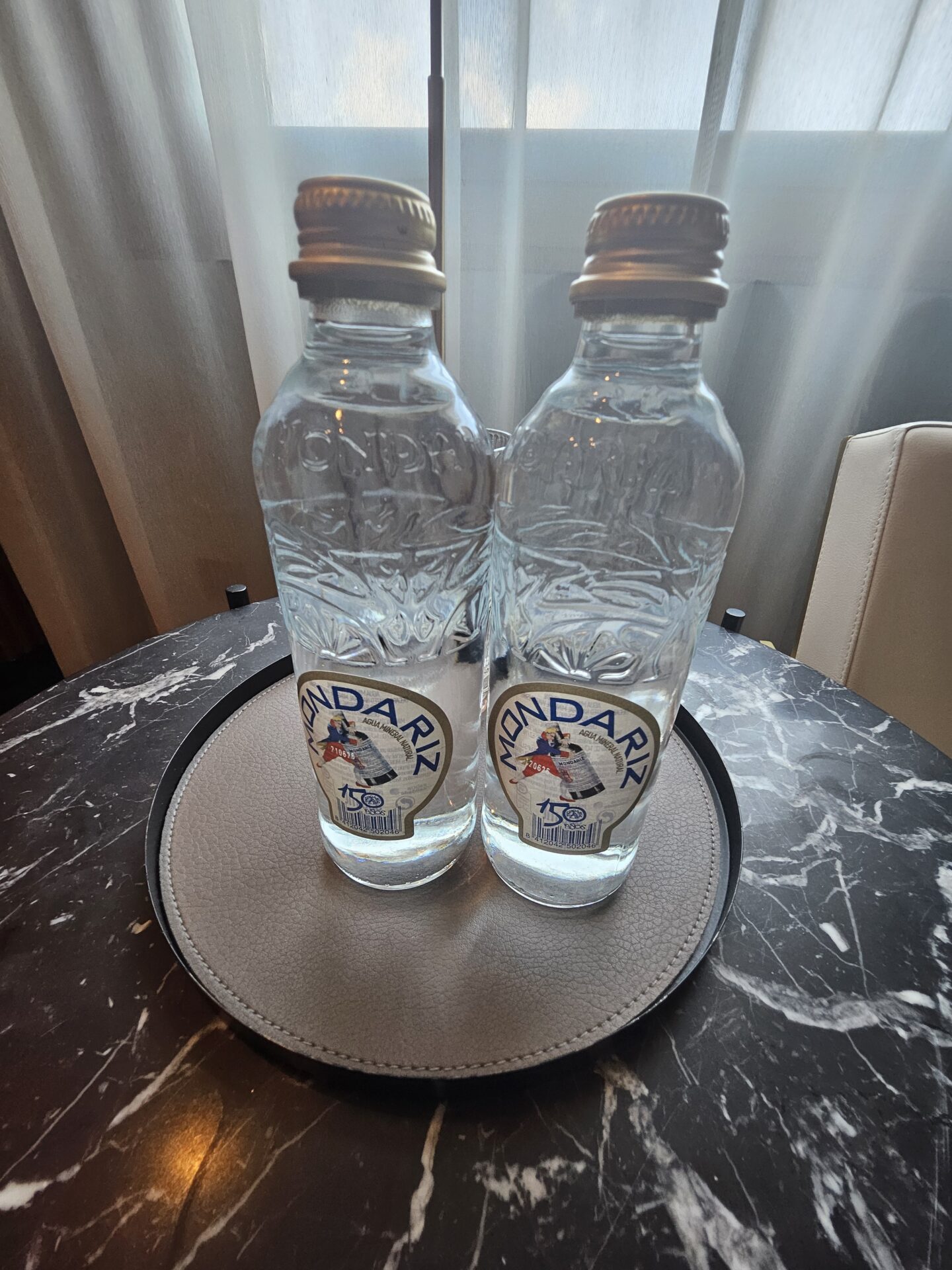 two bottles on a tray