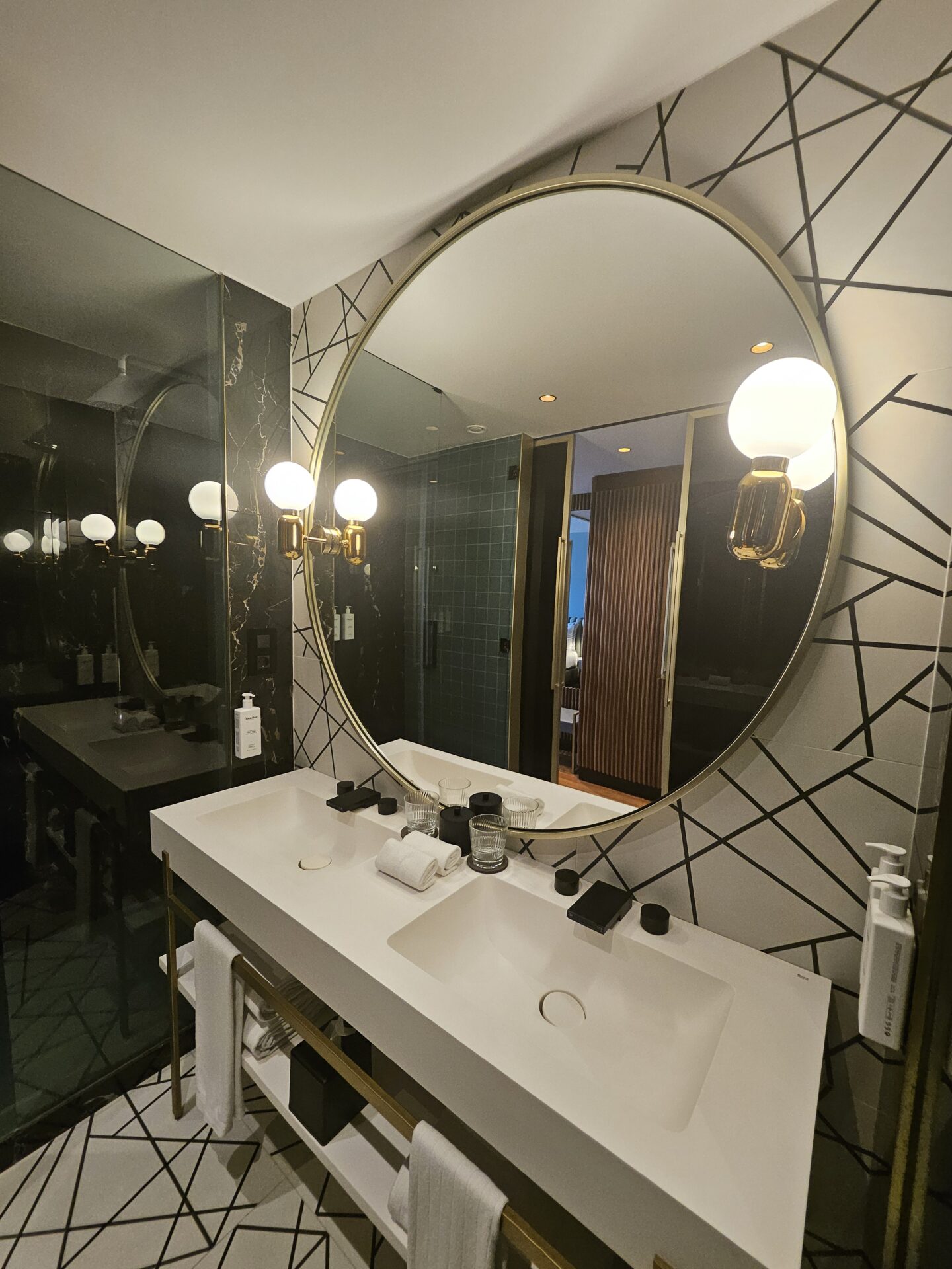 a bathroom with a large mirror