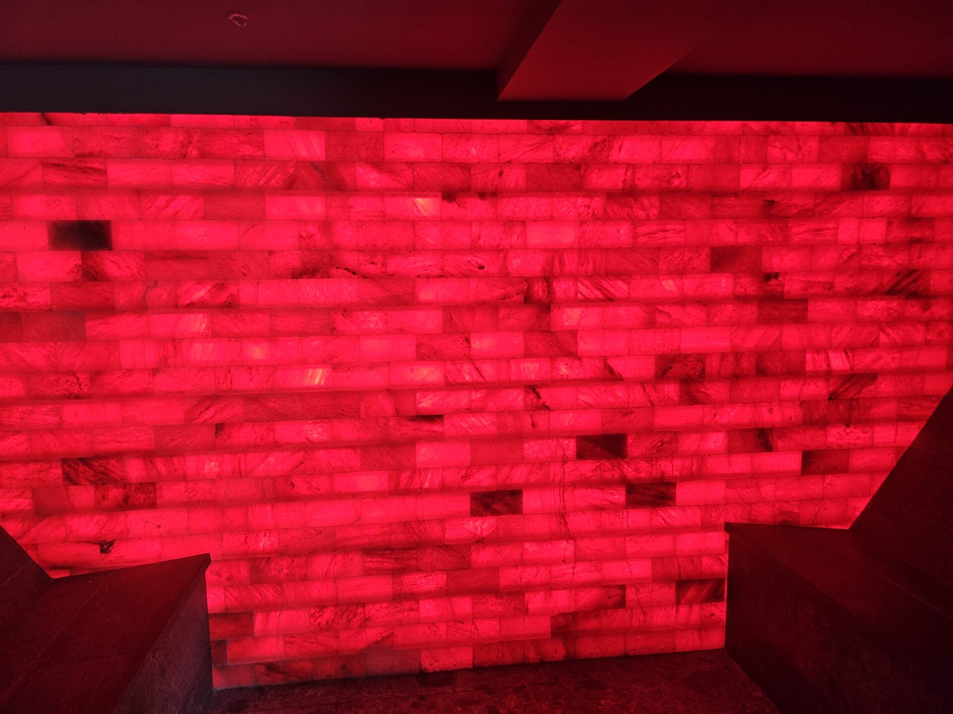 a red wall with lights