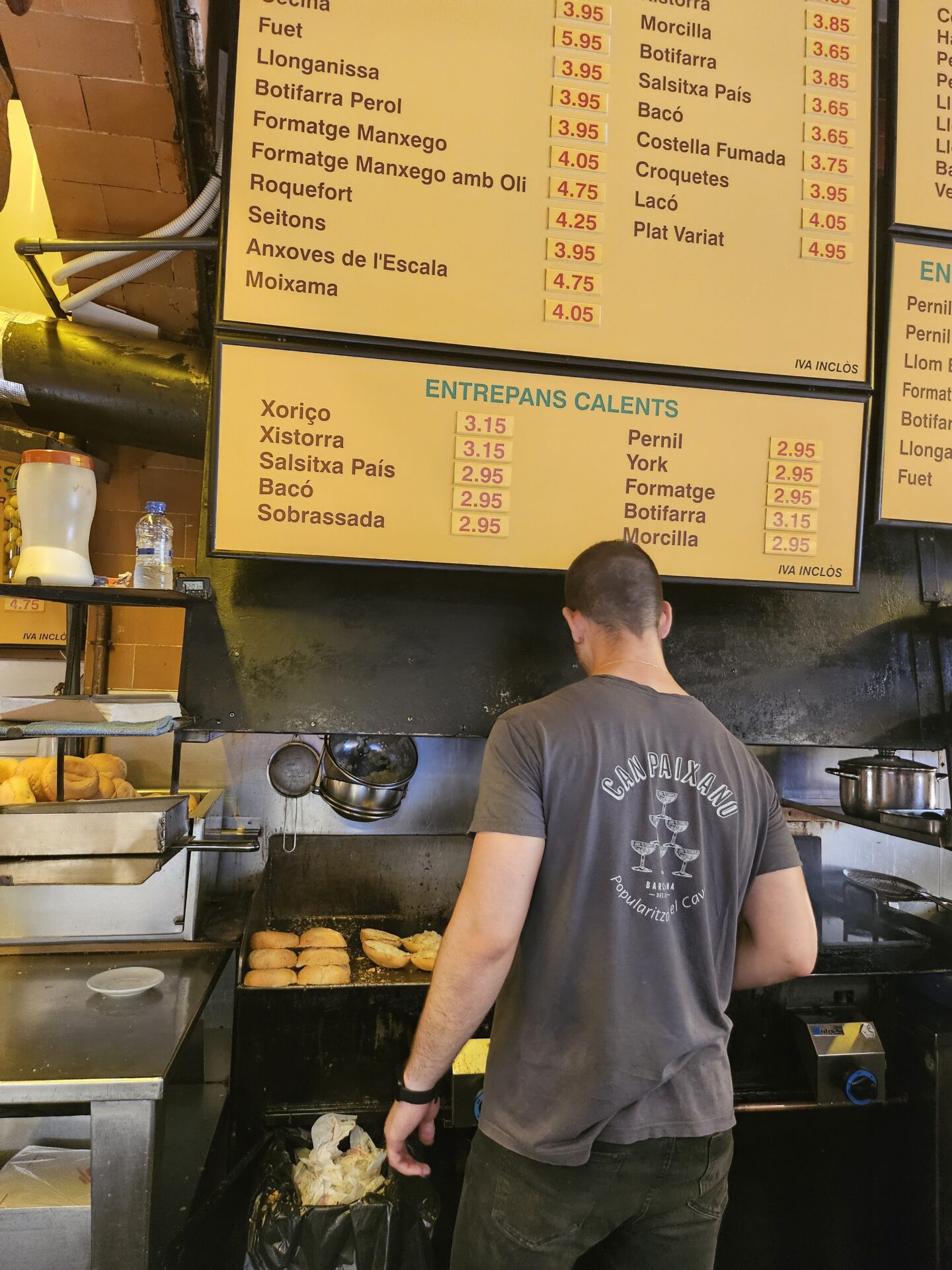 a man cooking food in a restaurant