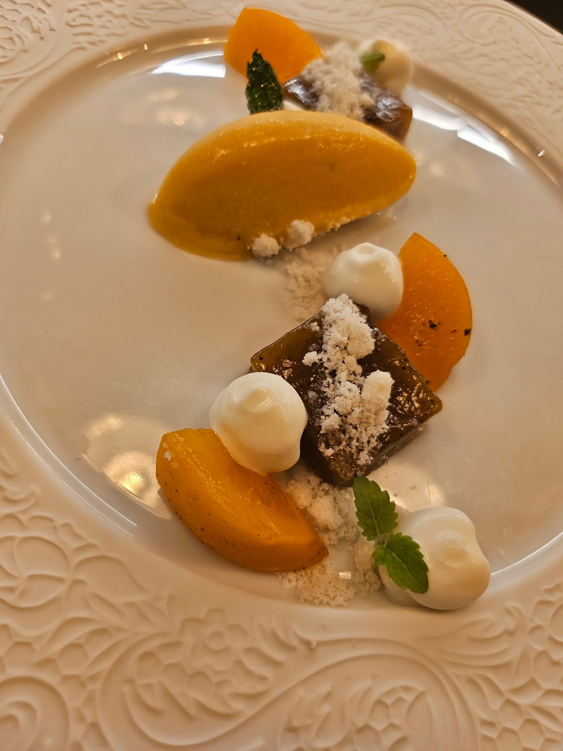 a plate of desserts on a table