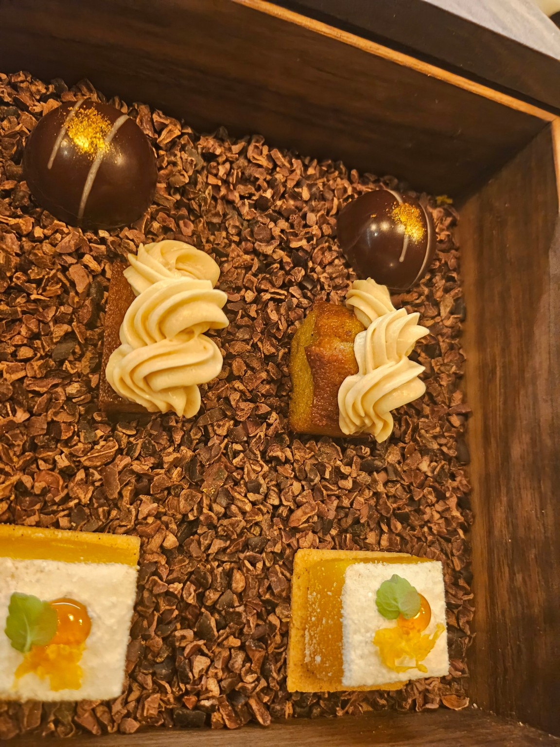 a tray of desserts on a table