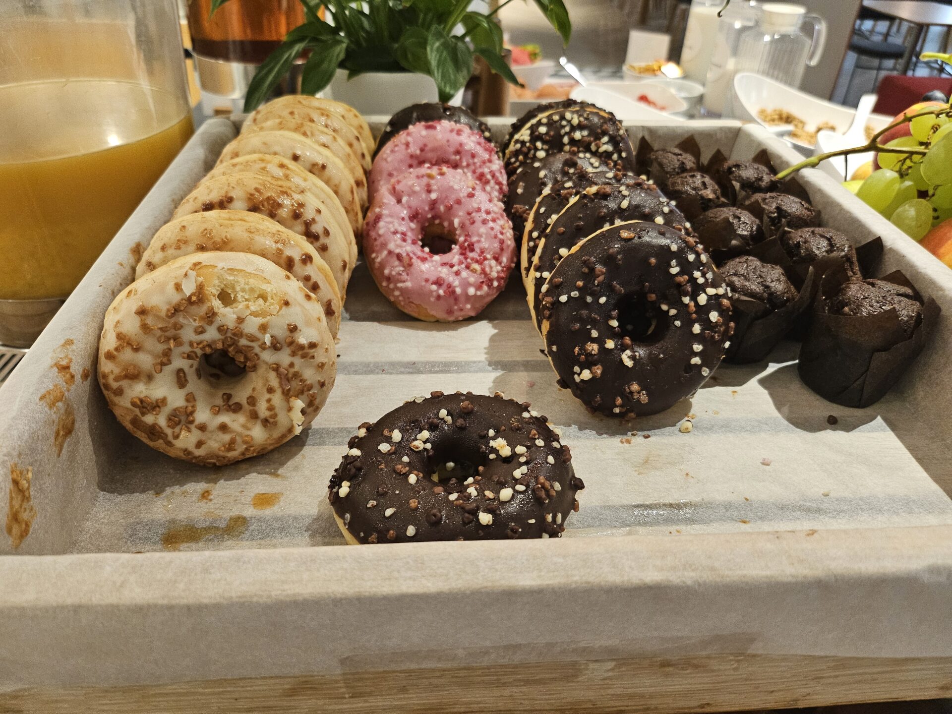 a tray of donuts and chocolates