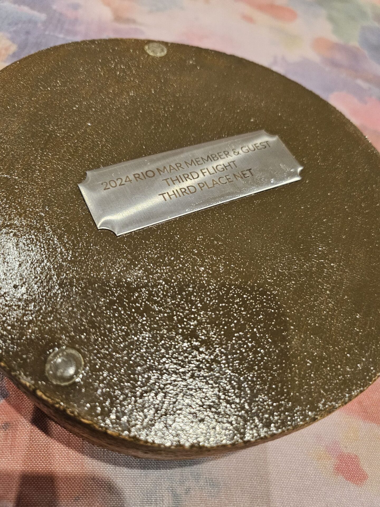 a metal plaque on a surface