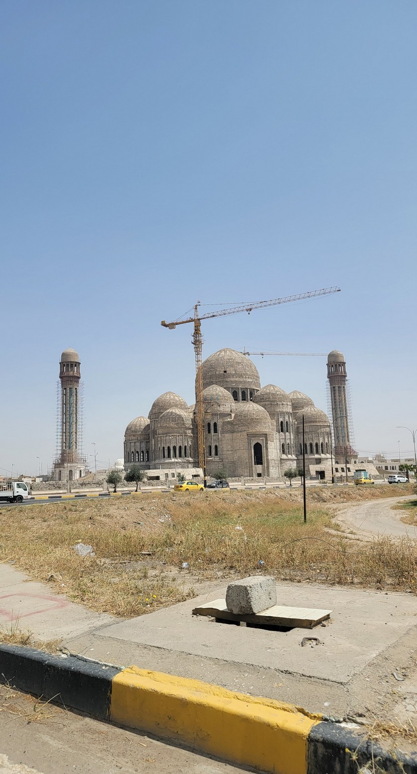 a large building with domes and towers