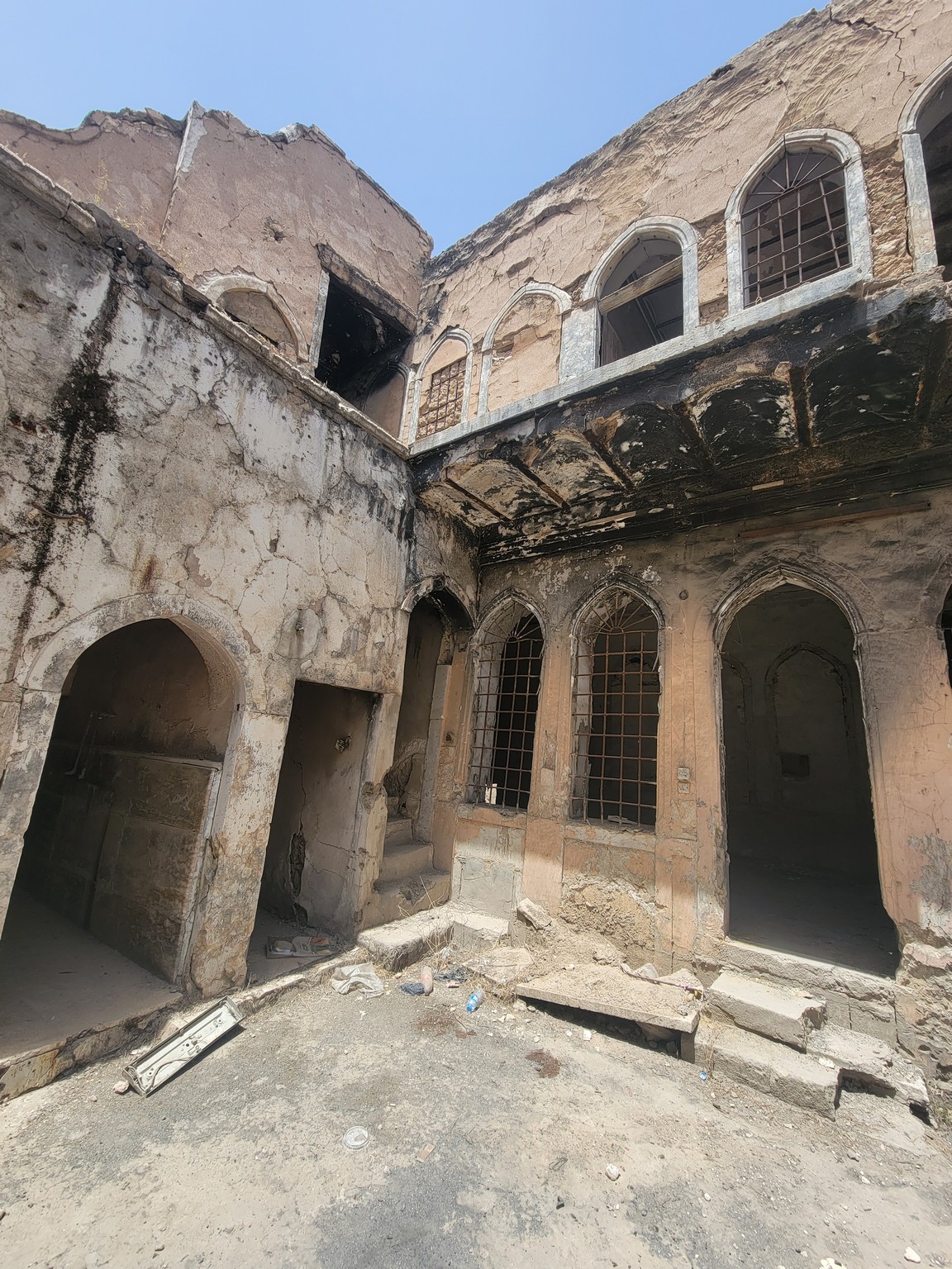 an old building with a broken roof