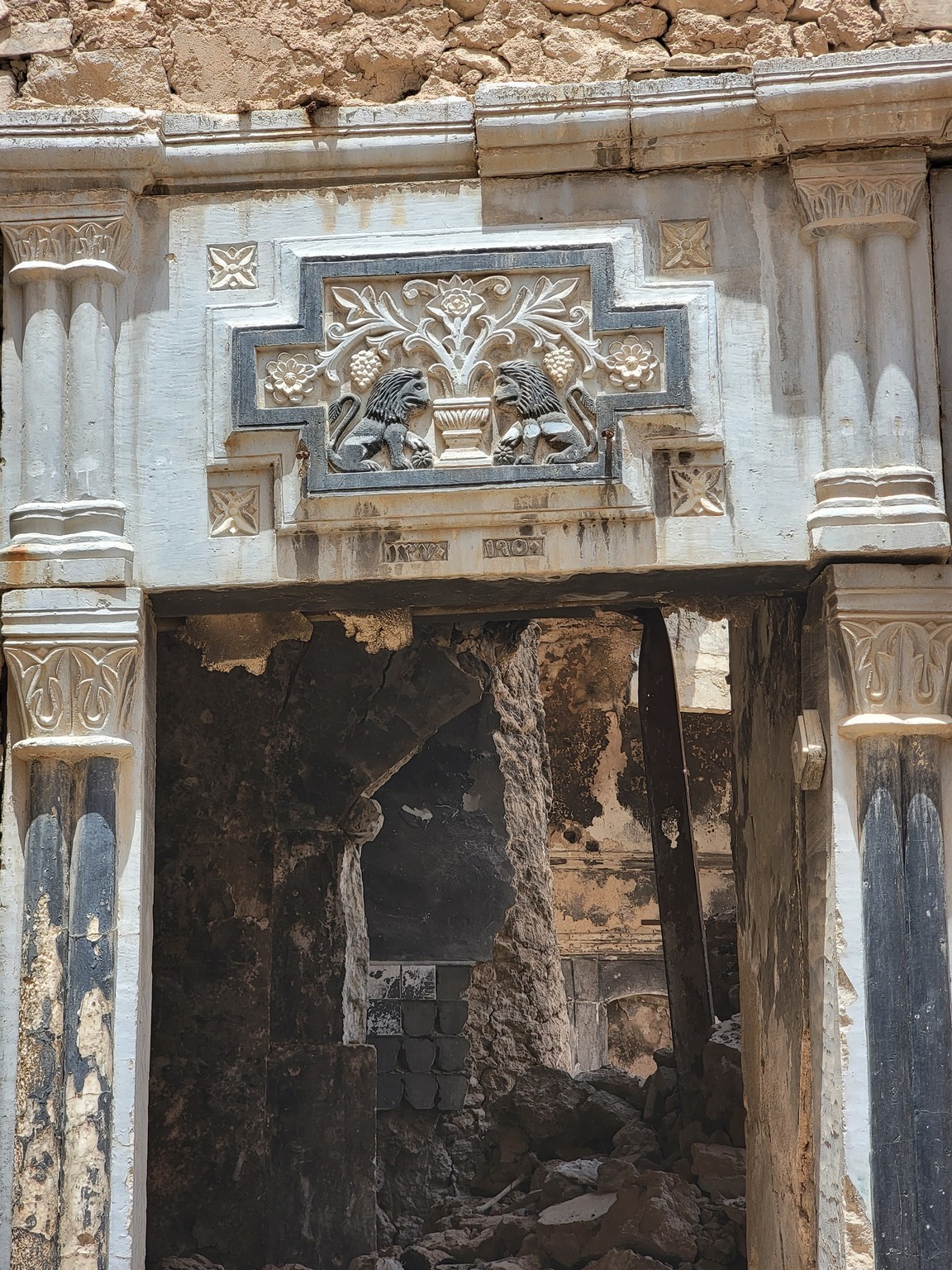 a stone archway with carvings