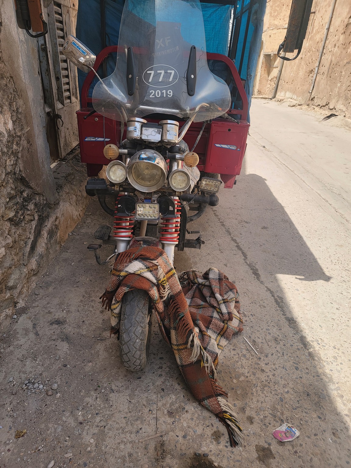 a motorcycle parked on the side of a road