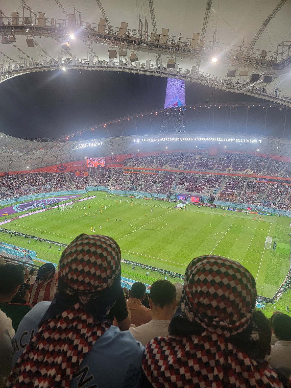 a group of people in a stadium