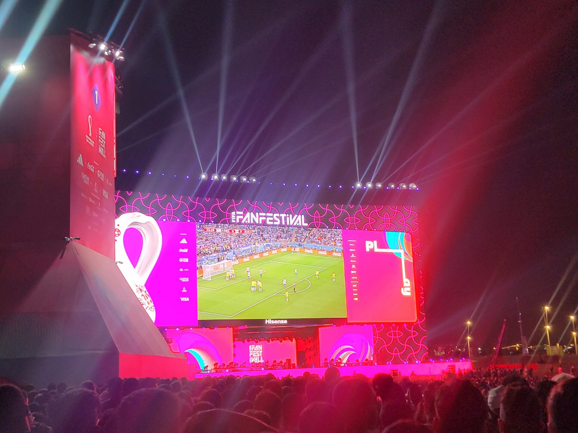 a large screen with a football field on it