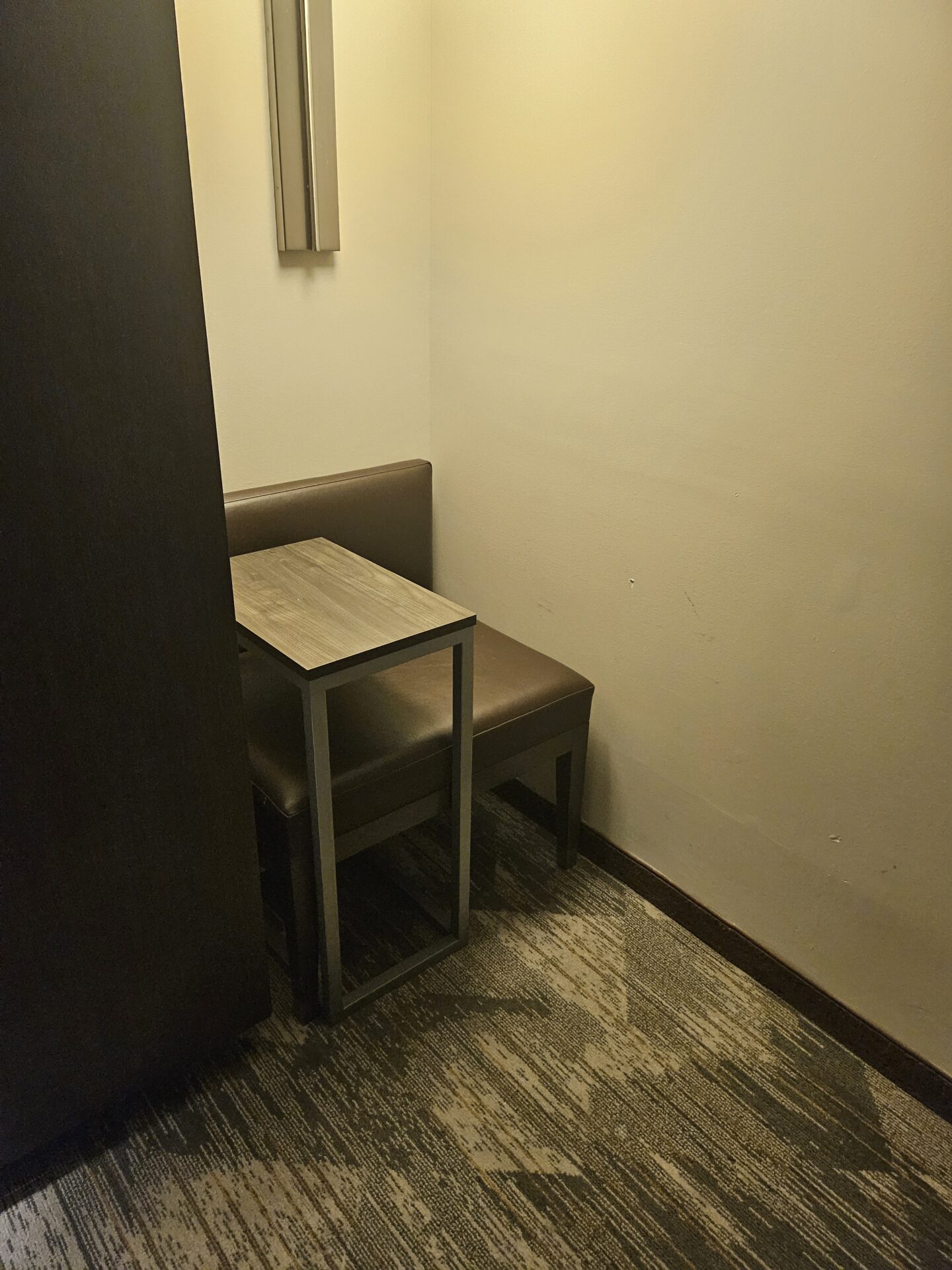 a table and chair in a room