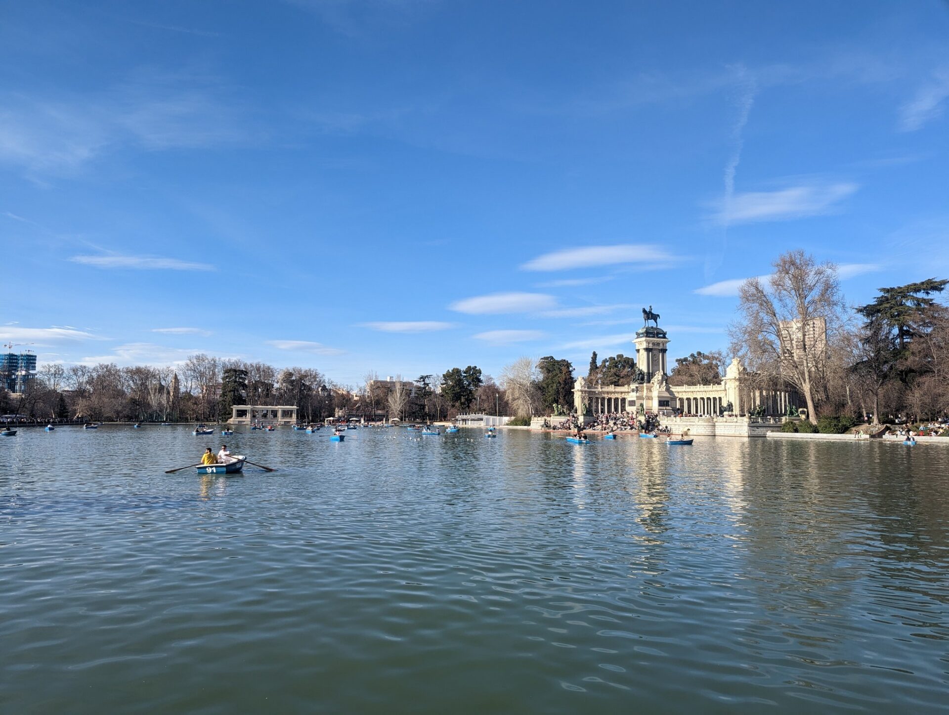 a group of people in boats on a lake