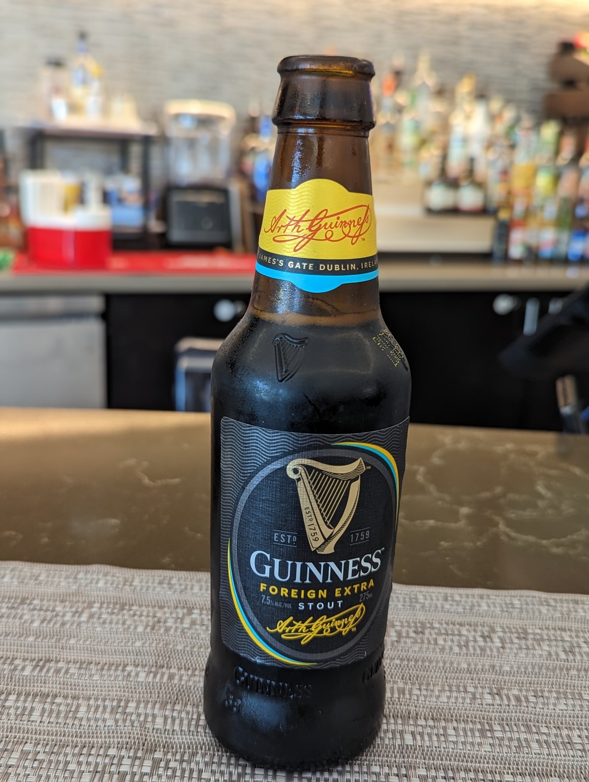 a bottle of beer on a counter