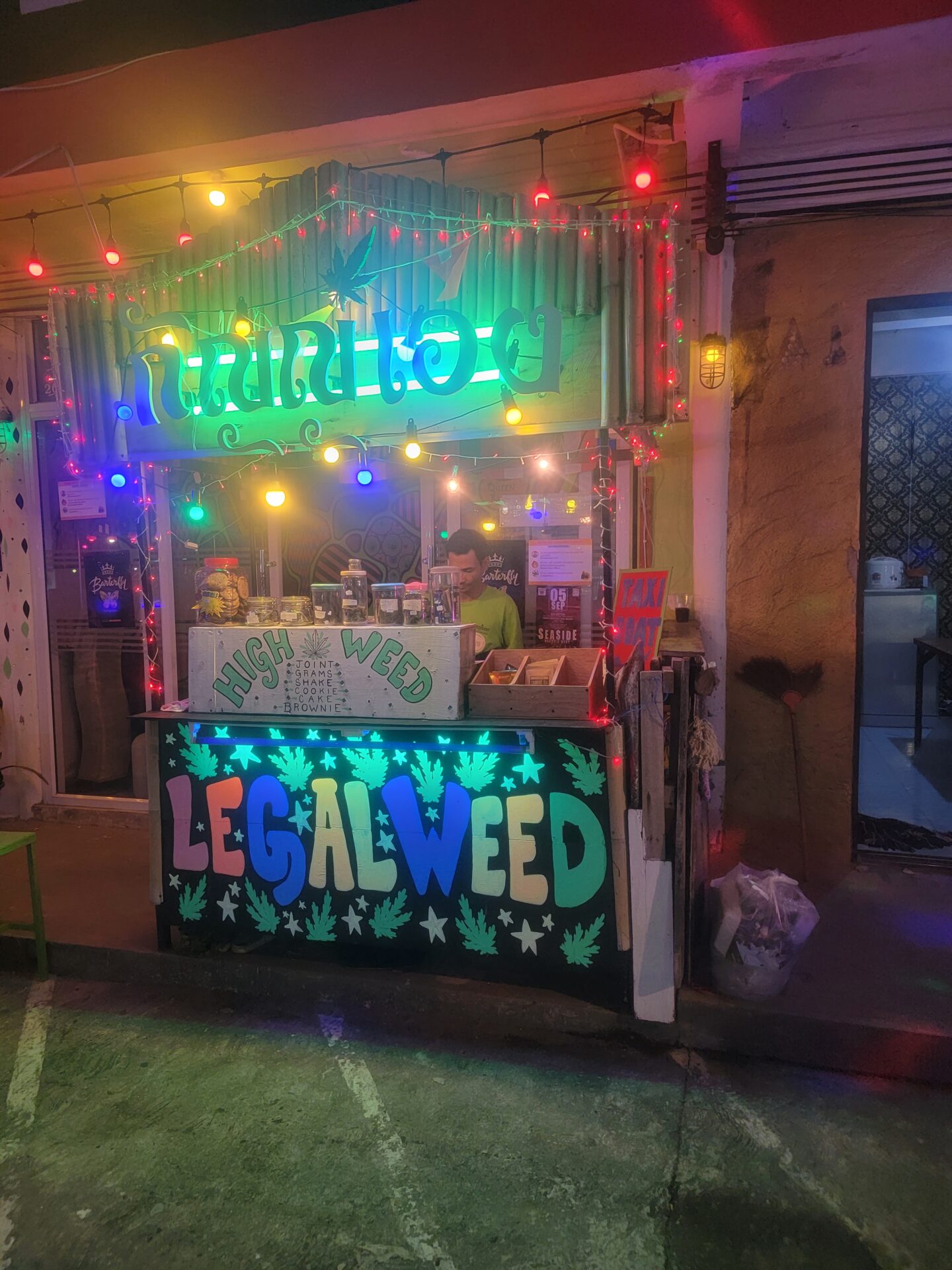 a small store with colorful lights