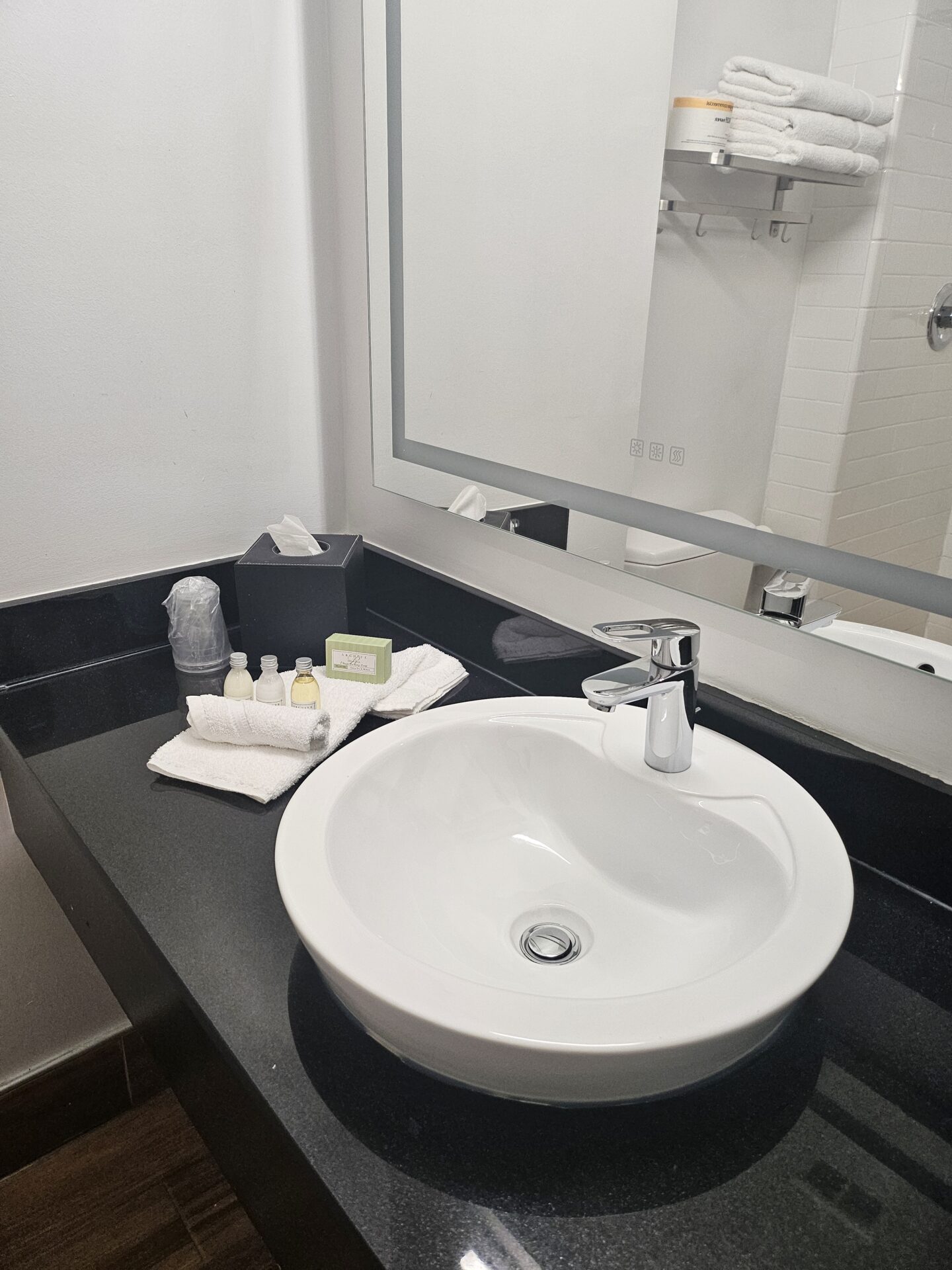 a sink and mirror in a bathroom