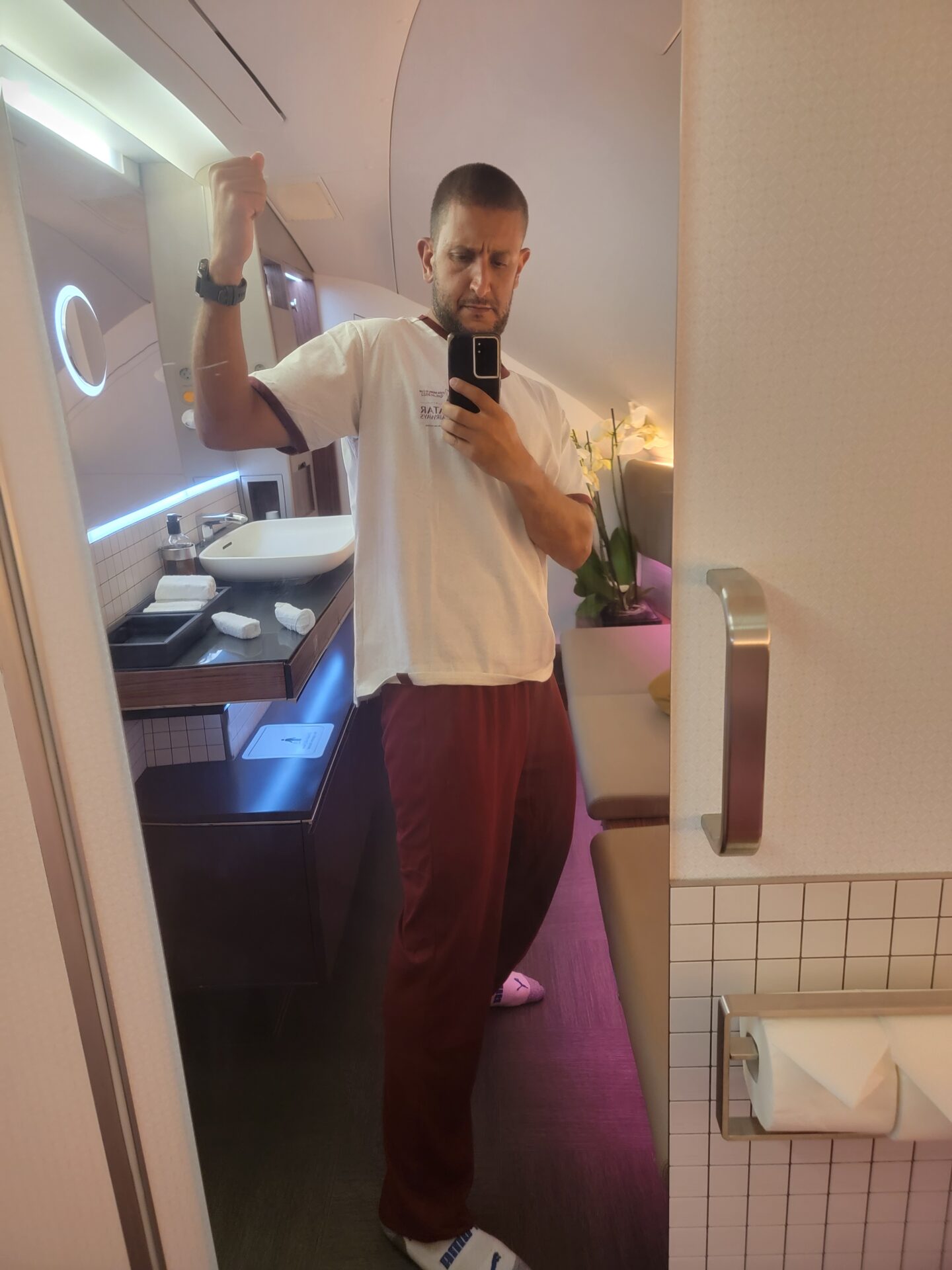 a man taking a selfie in a mirror