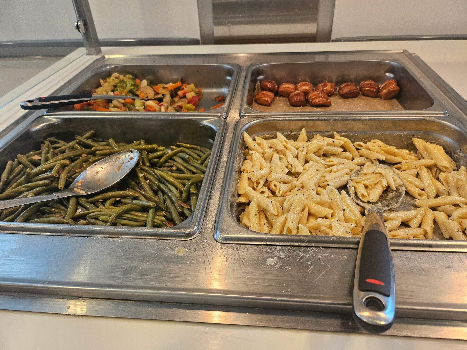 a tray of food in a buffet