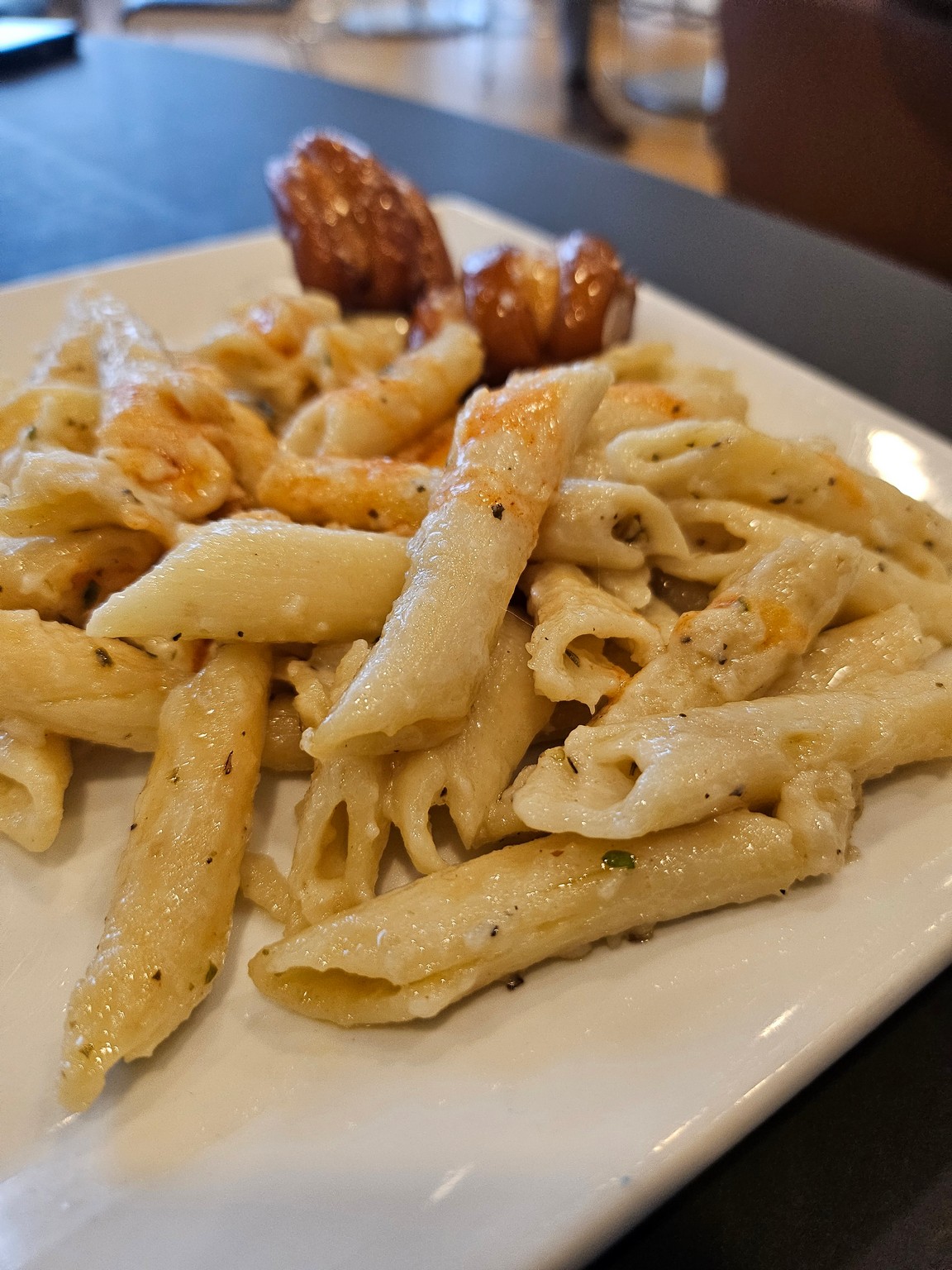 a plate of pasta on a table