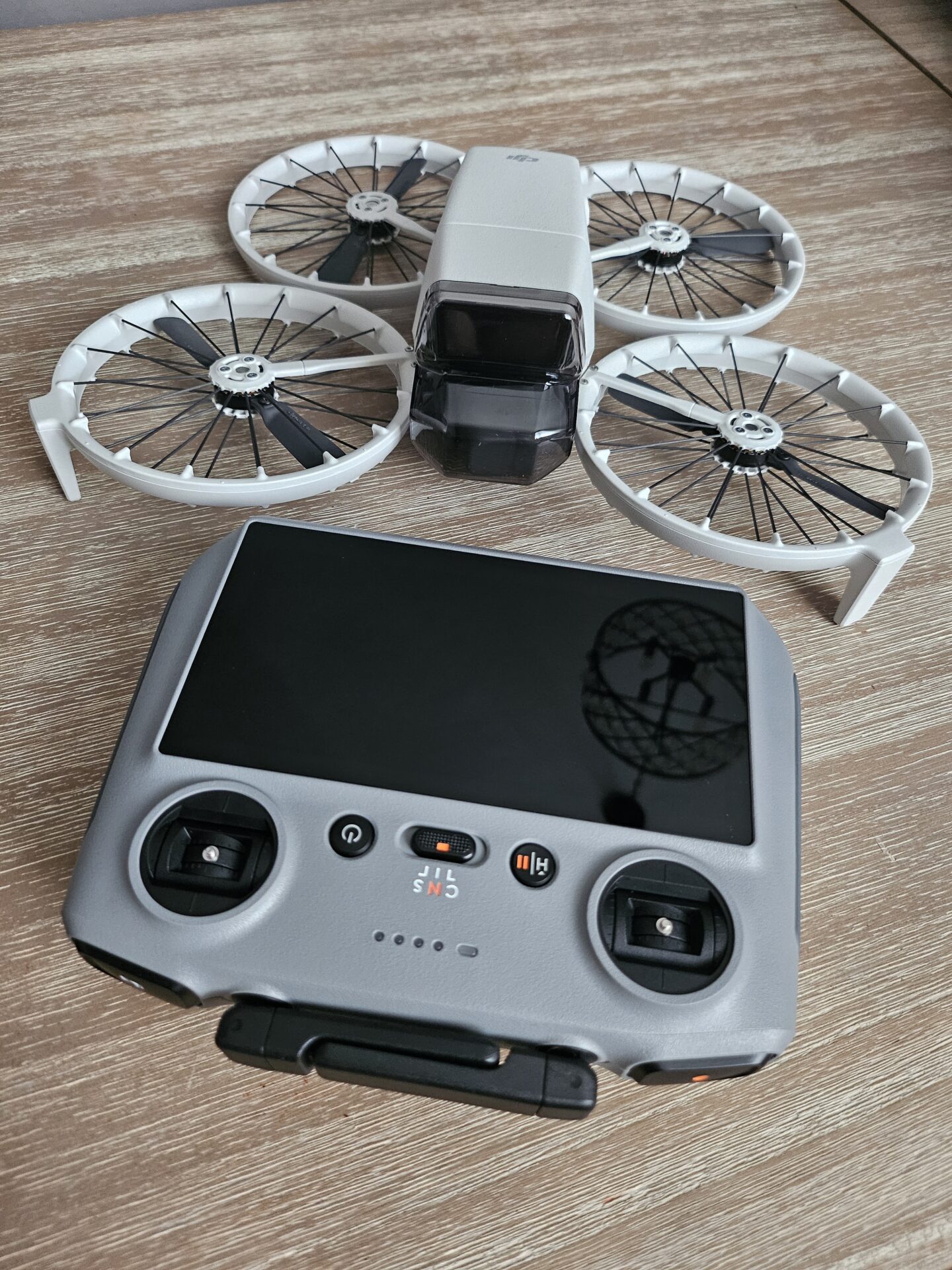 a drone with a camera and a remote control