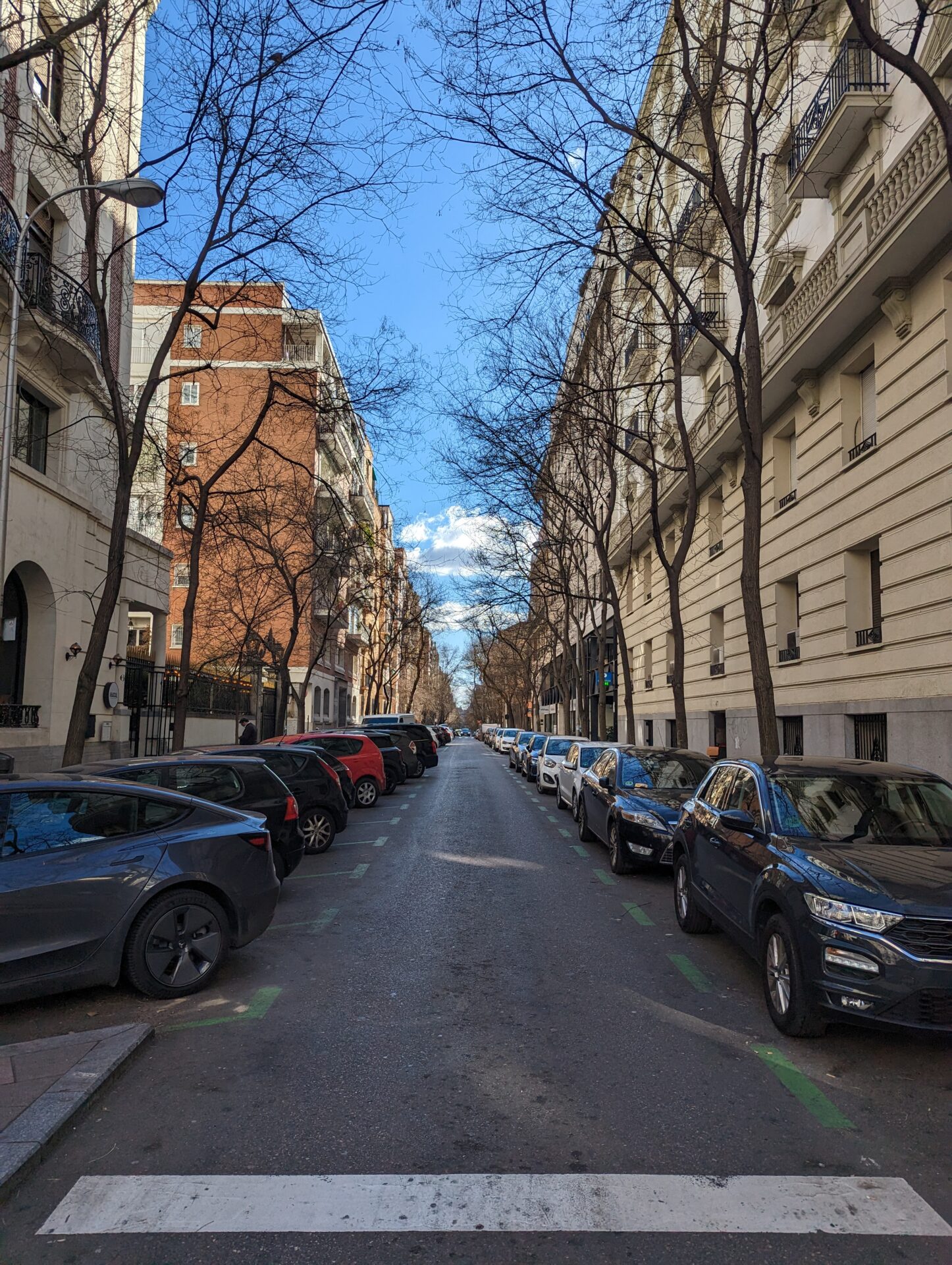 a street with cars parked on it