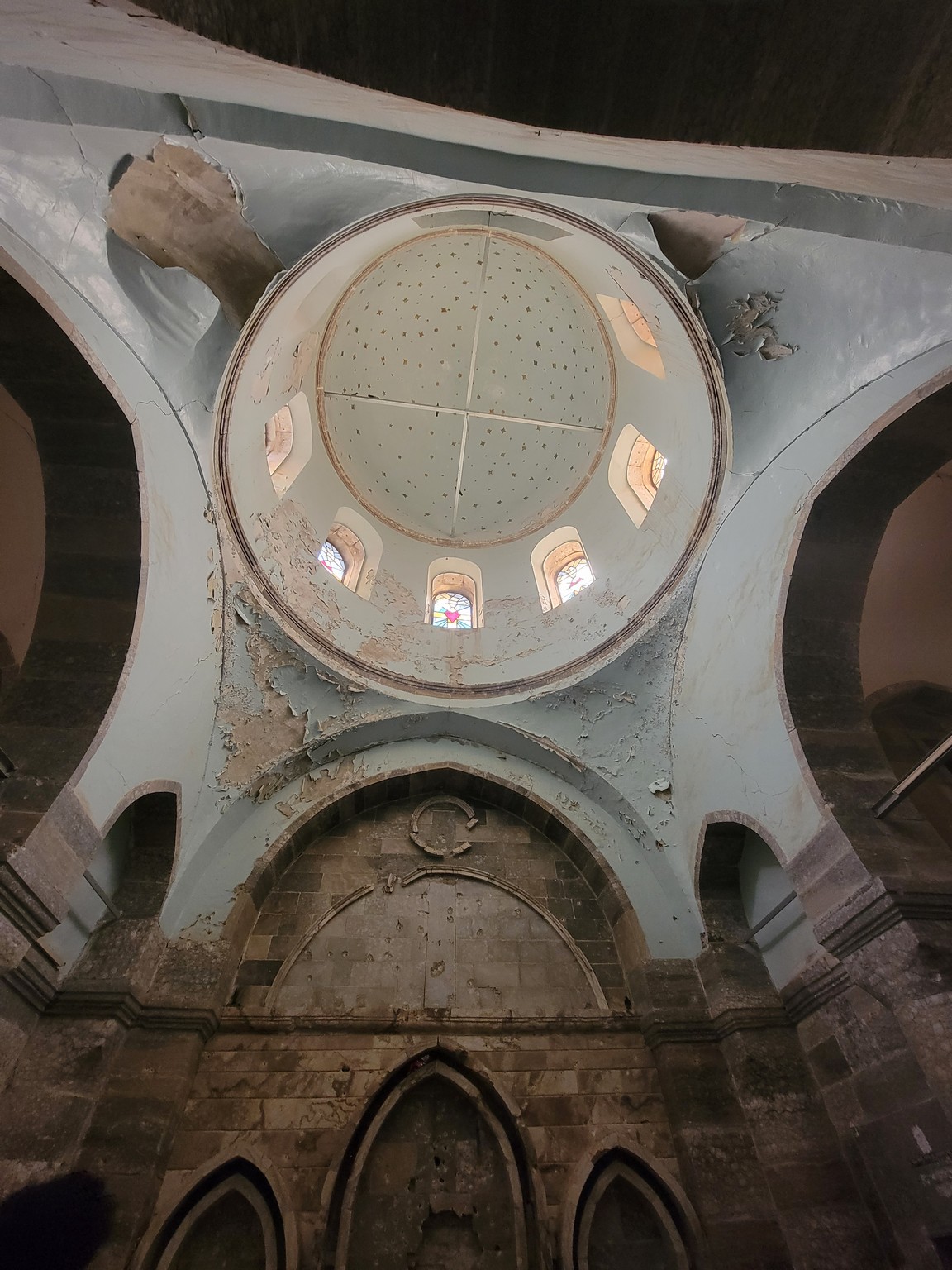 a ceiling with a round window