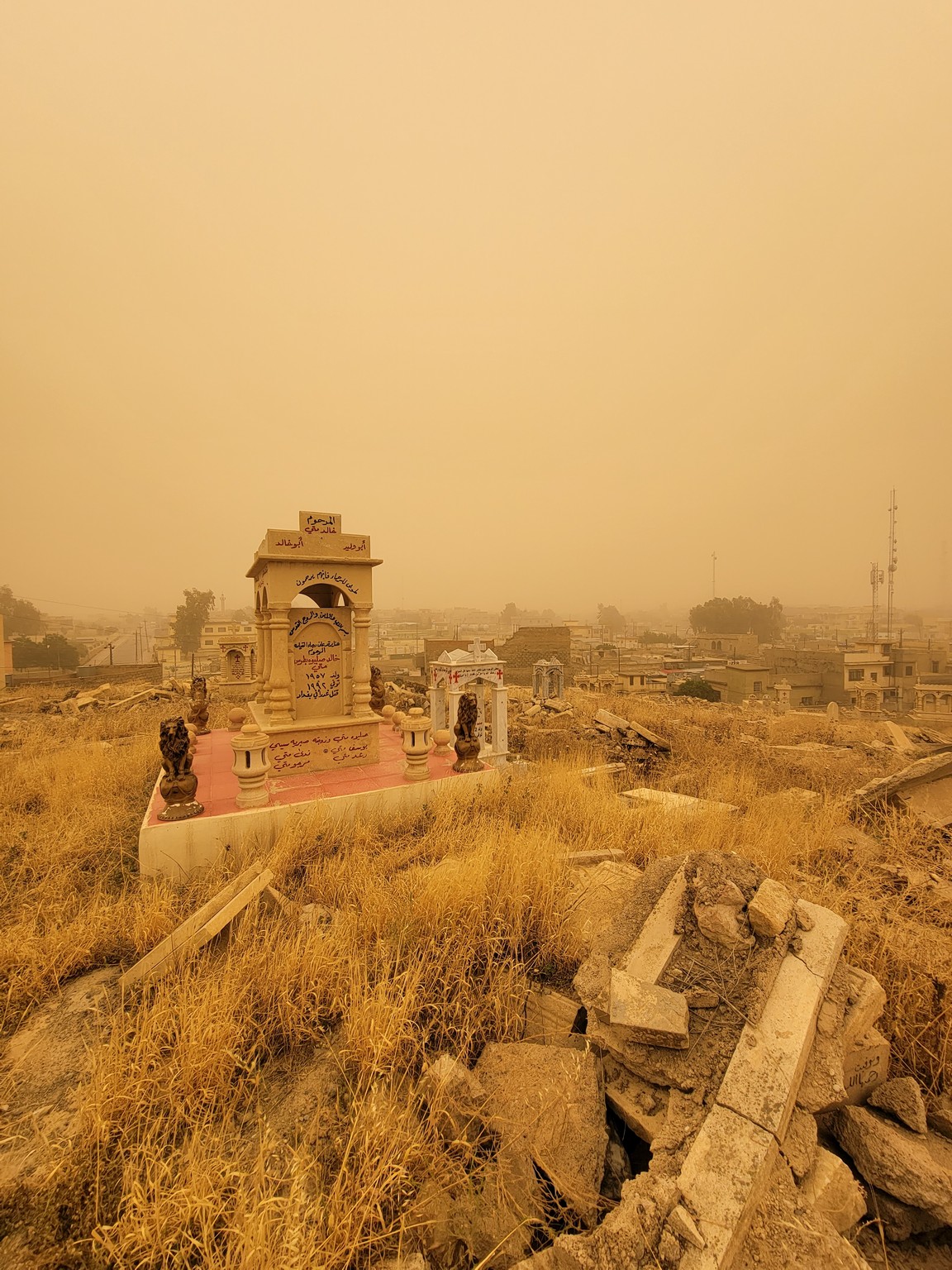 a cemetery in a dry field