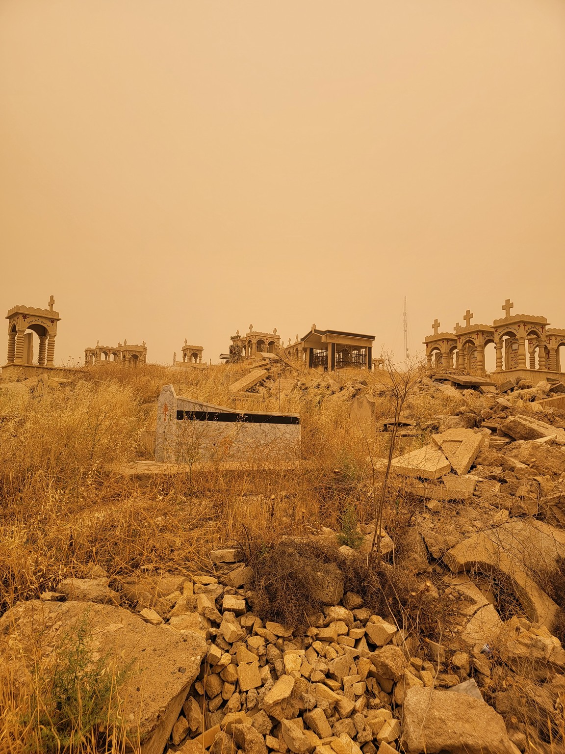 a stone ruins on a hill