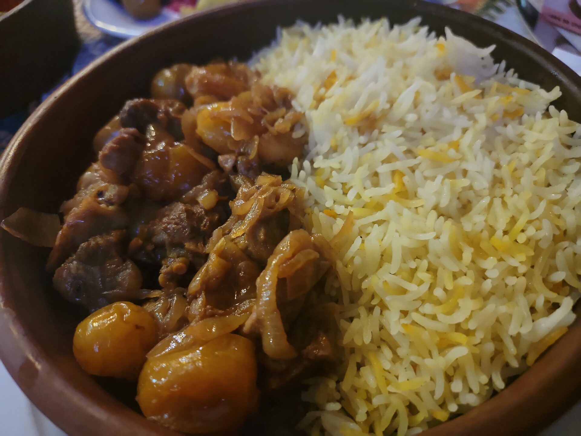 a bowl of rice and meat