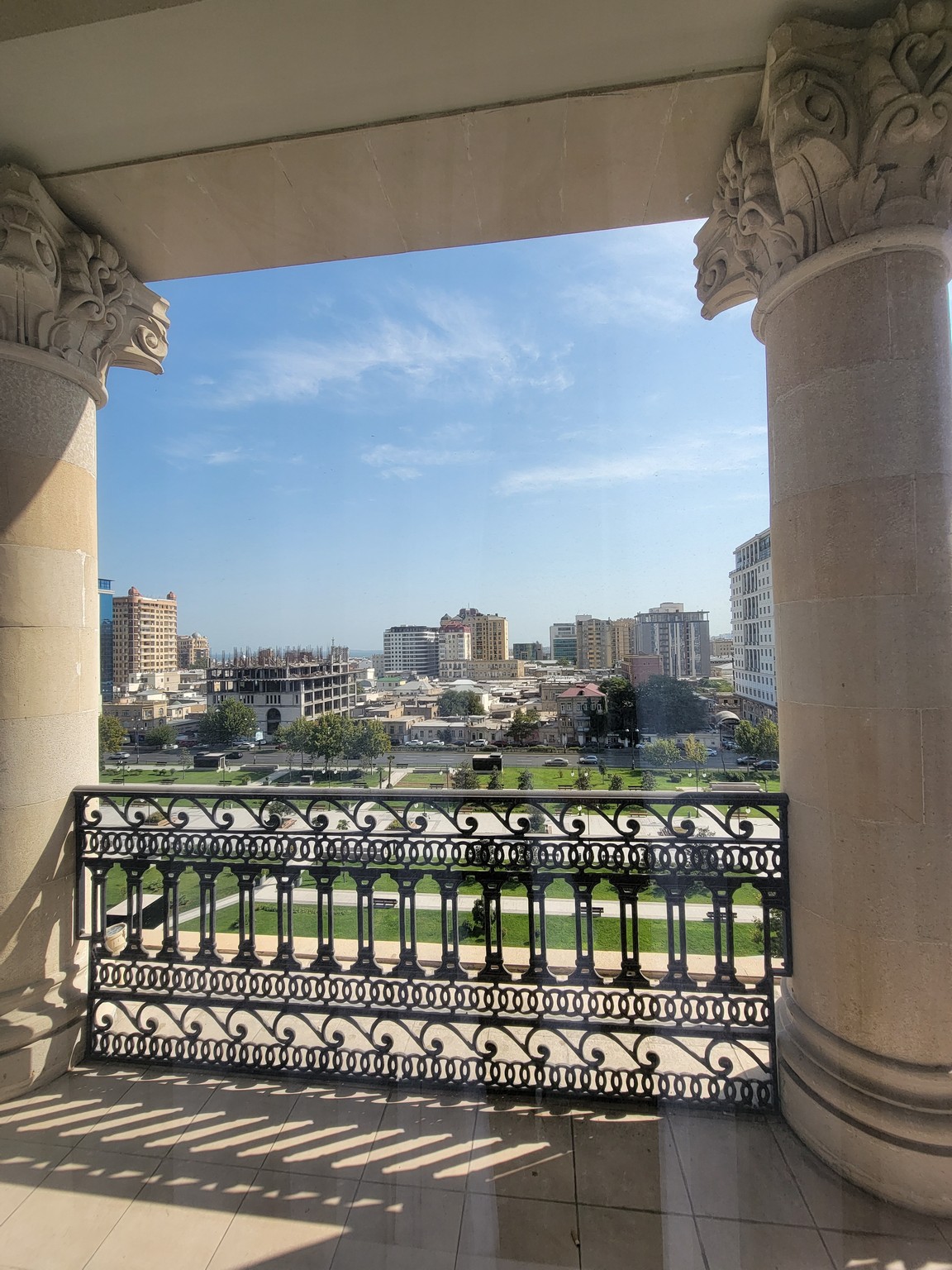 a view of a city from a balcony