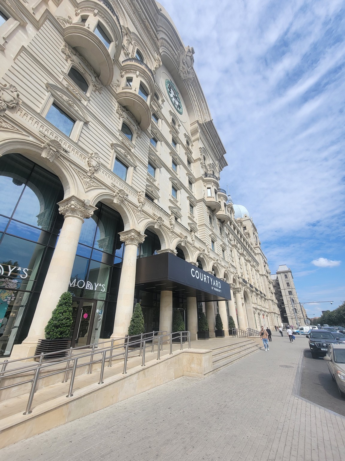 a building with a clock on the front