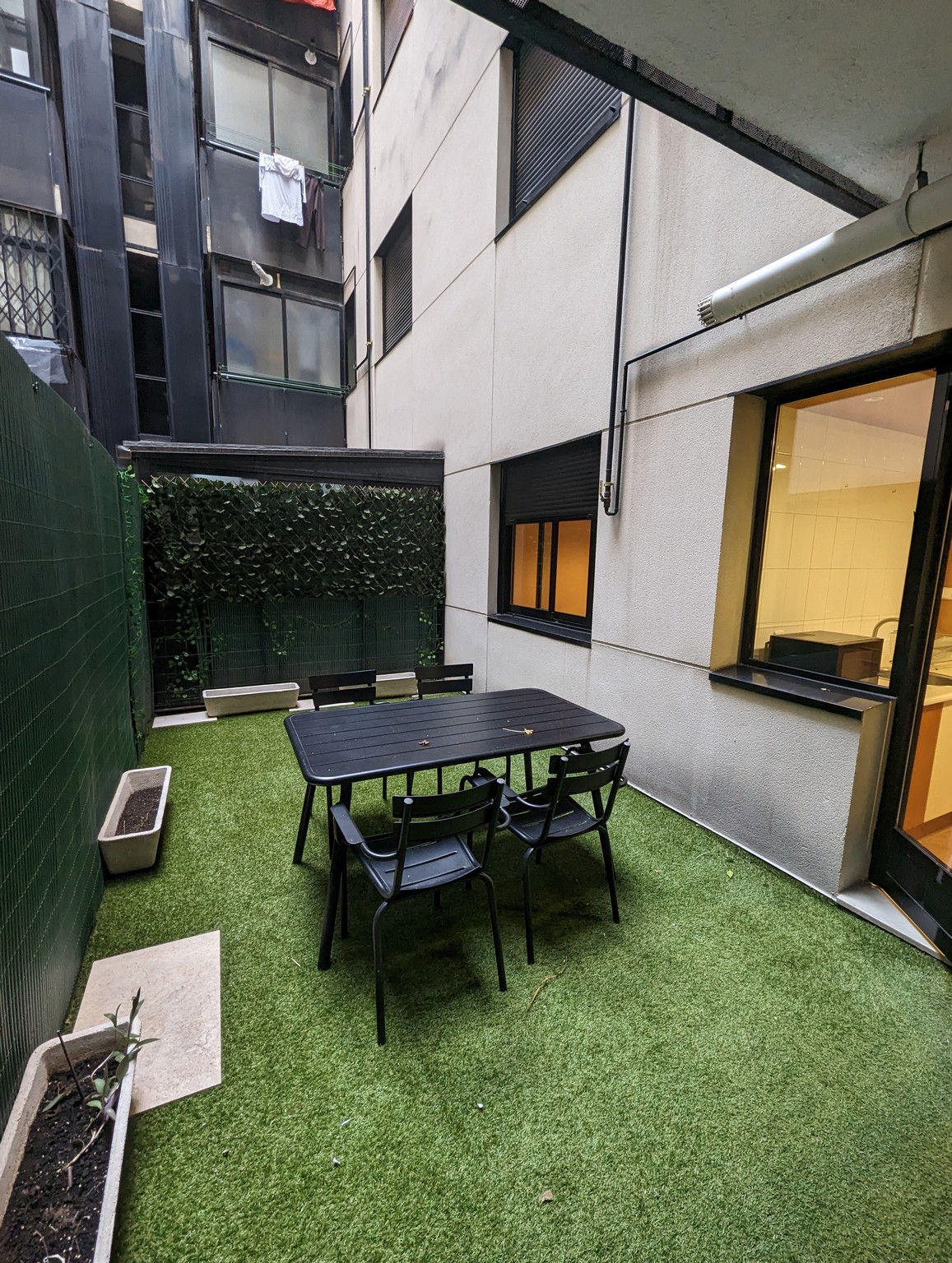 a table and chairs on a patio