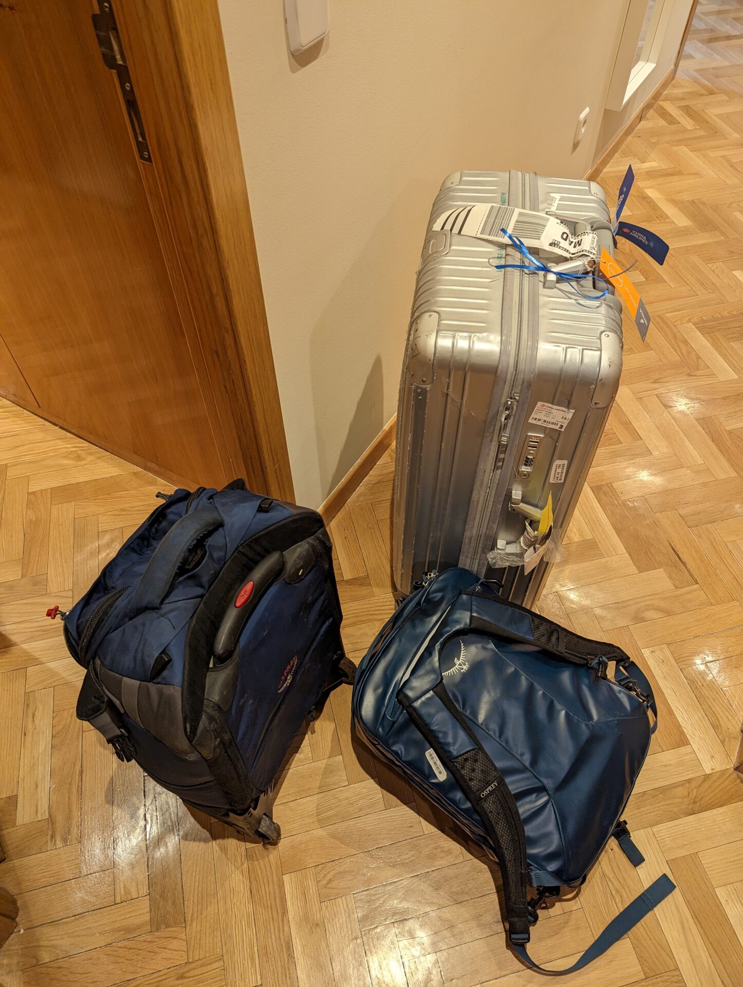 a group of luggage on the floor