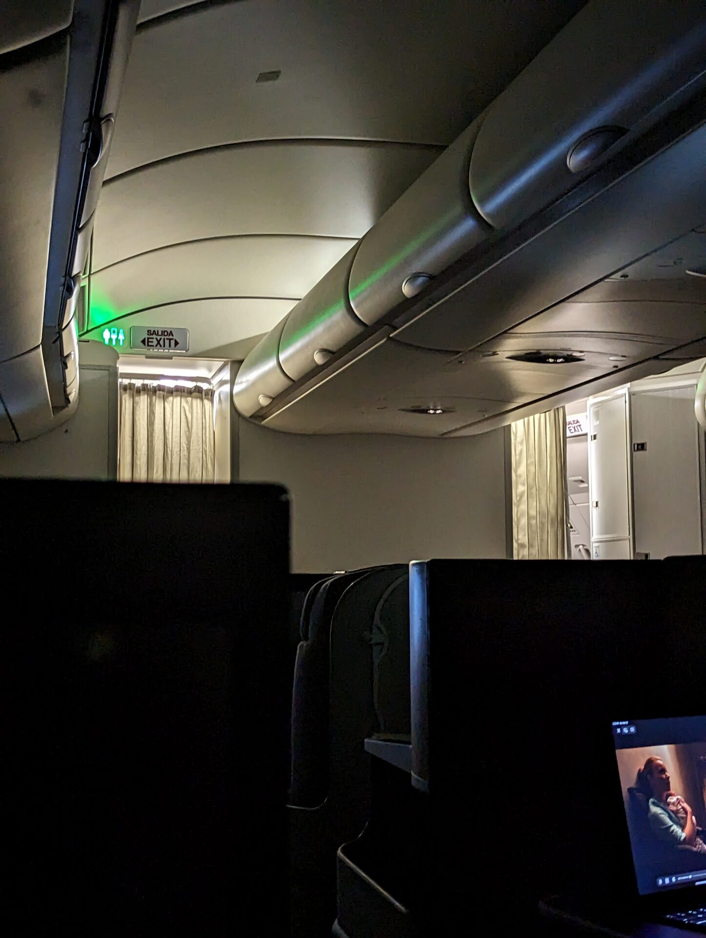 an airplane with a green light