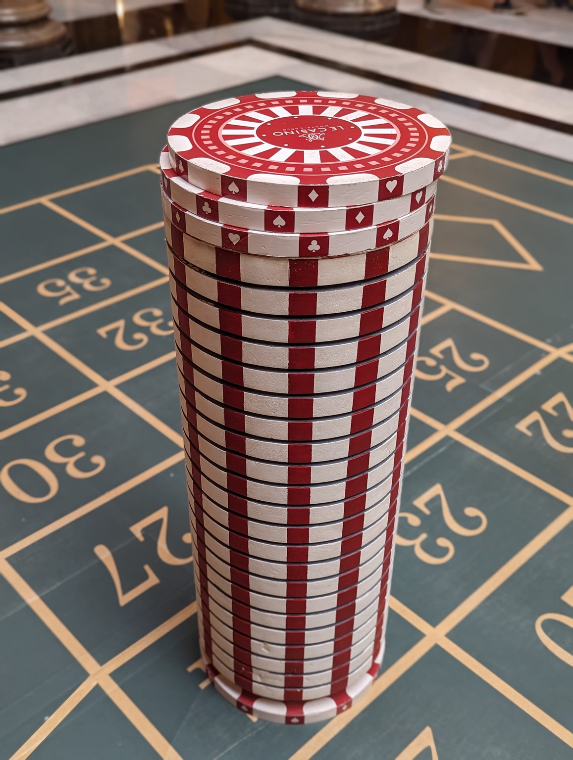 a stack of poker chips on a table