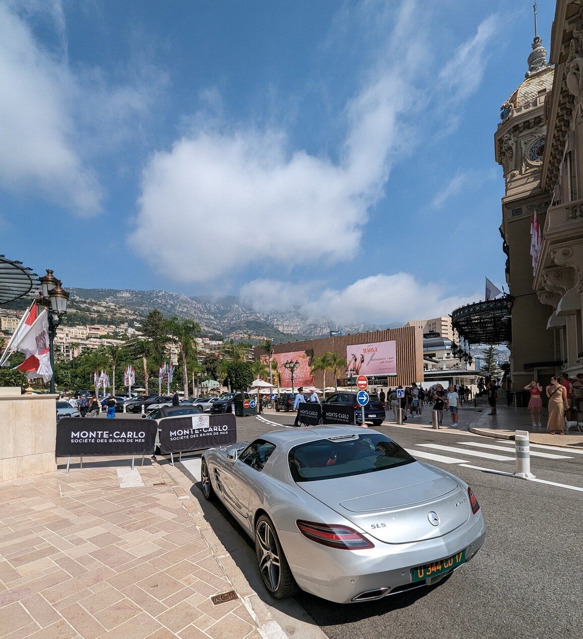 a silver car on the street