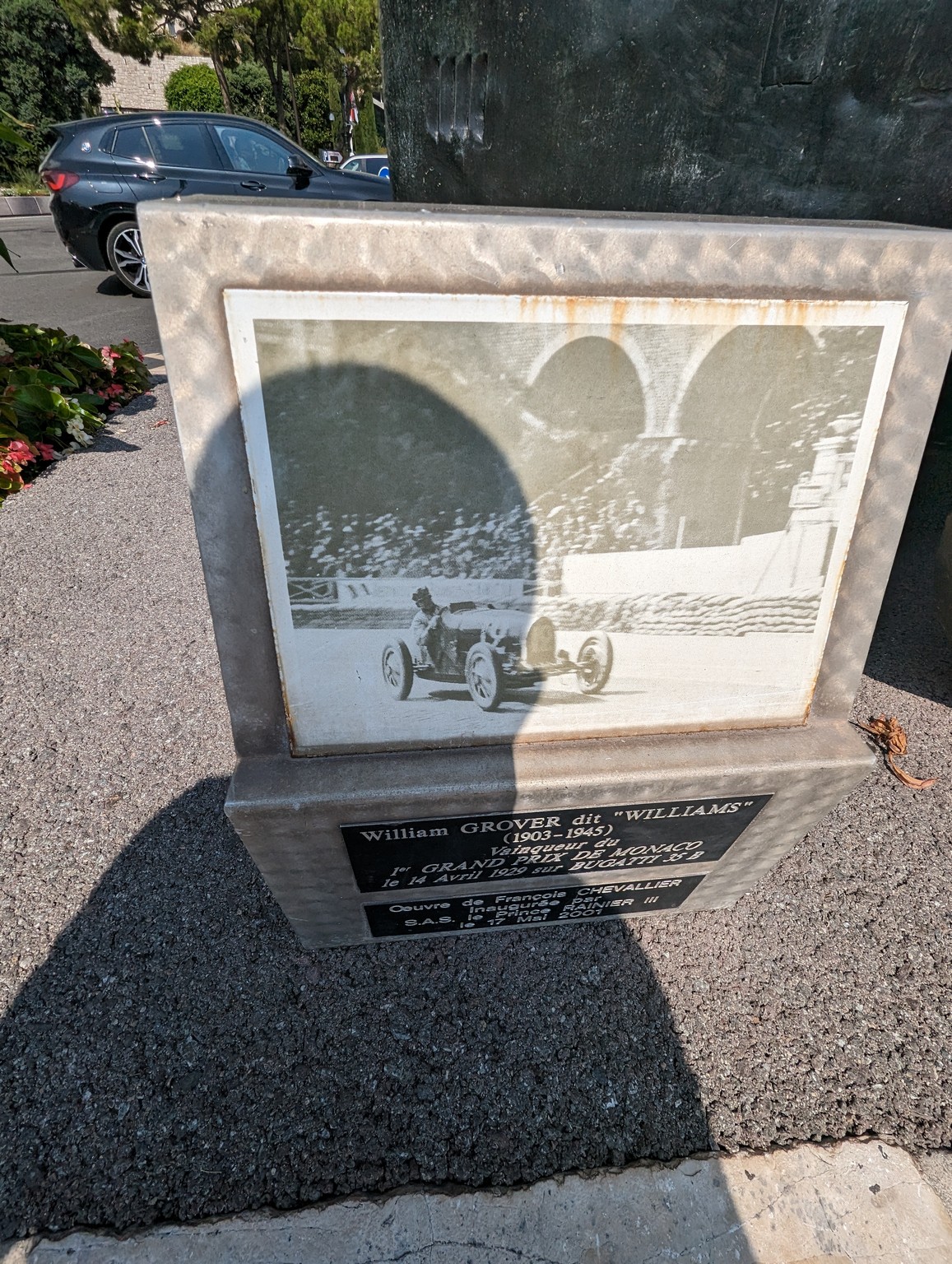 a stone plaque with a picture of a race car