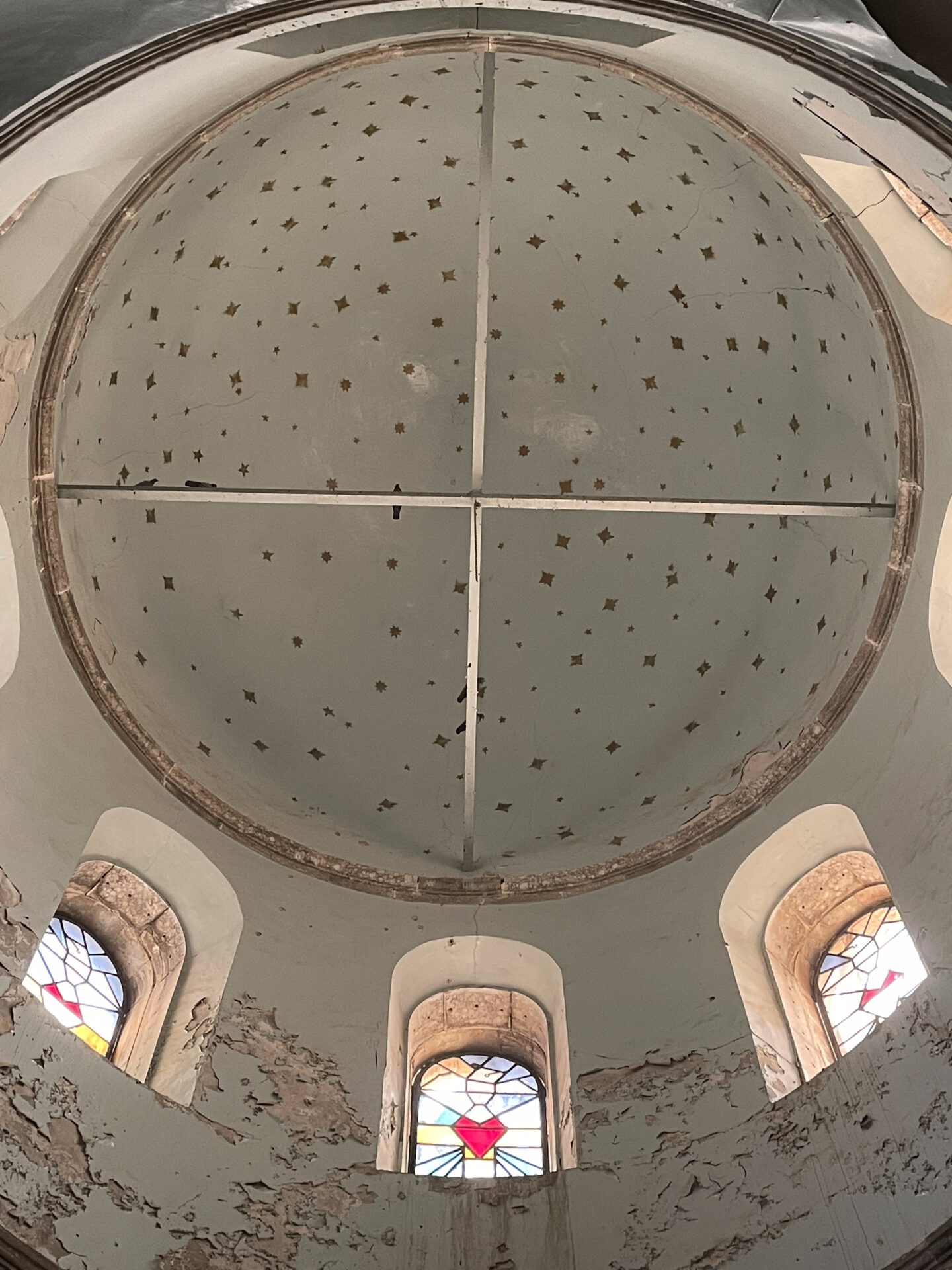 a ceiling with many windows