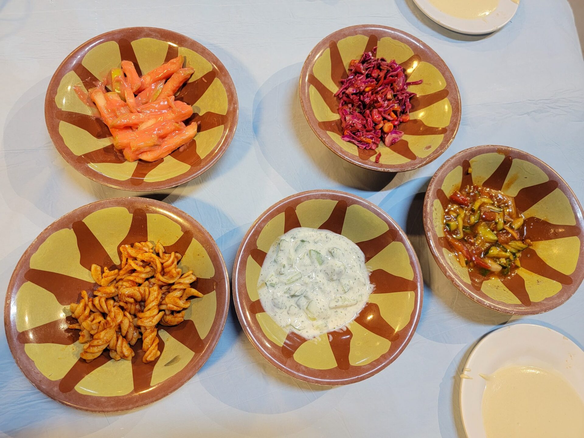 a group of bowls of food