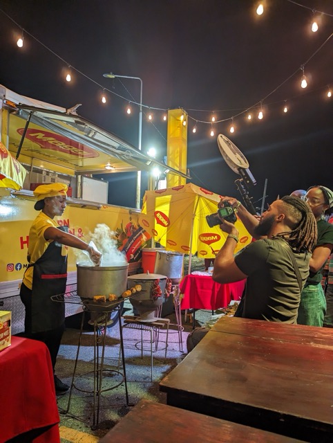 a group of people cooking food