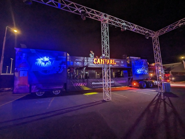 a truck with blue lights and a sign