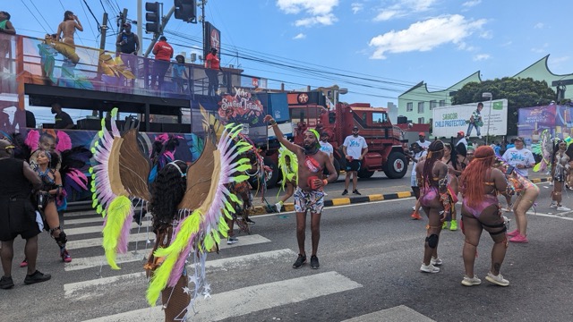 a group of people in garment on a street