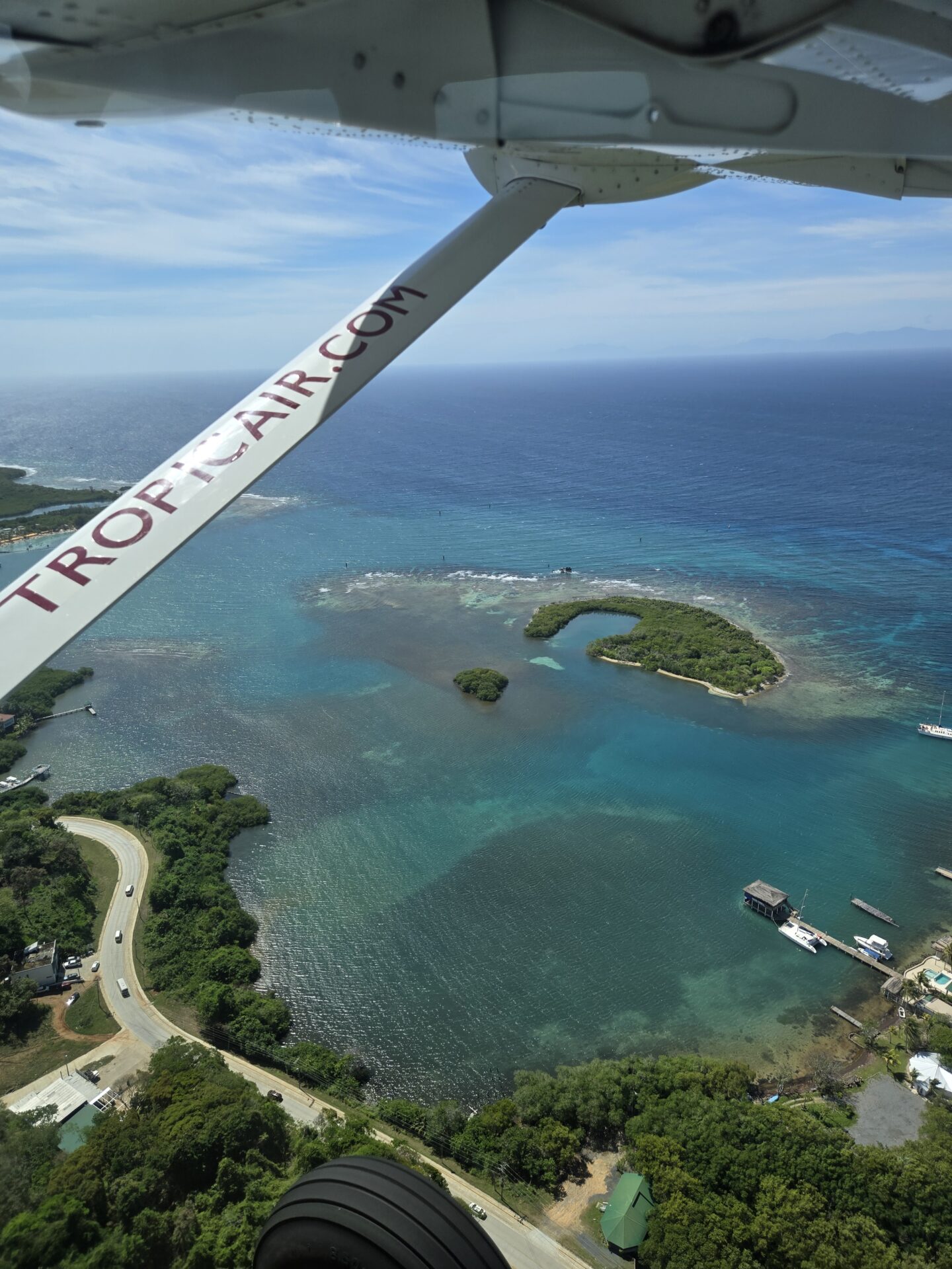 an aerial view of a body of water and land
