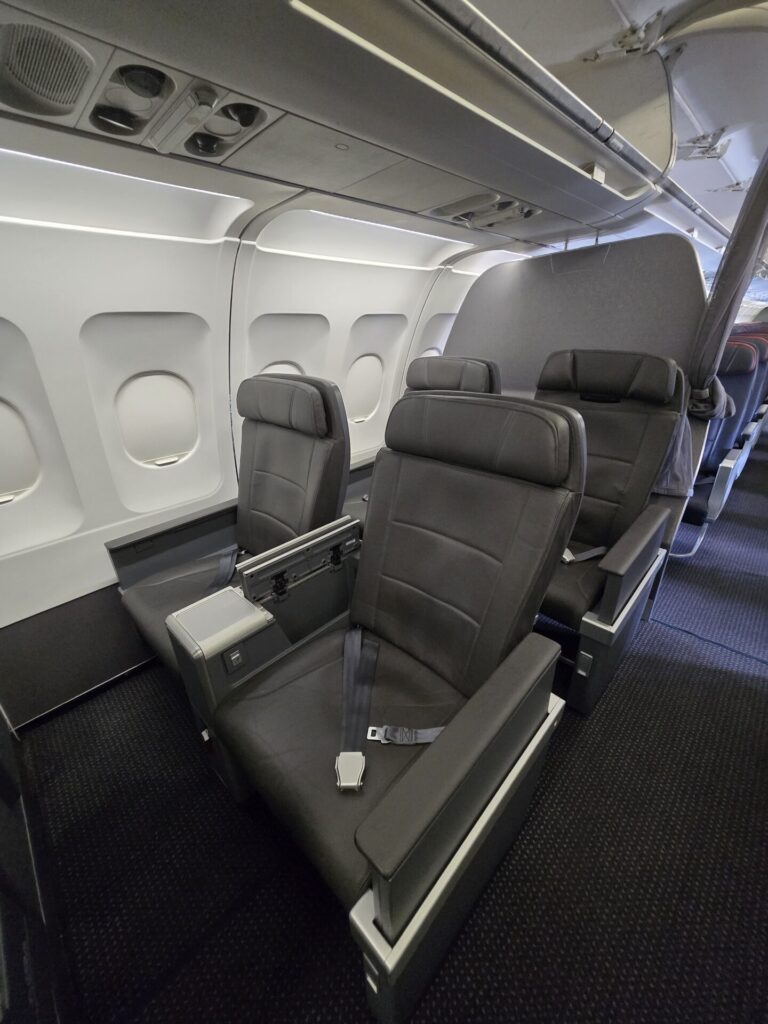 AA MIA-Roatan: Business or First?