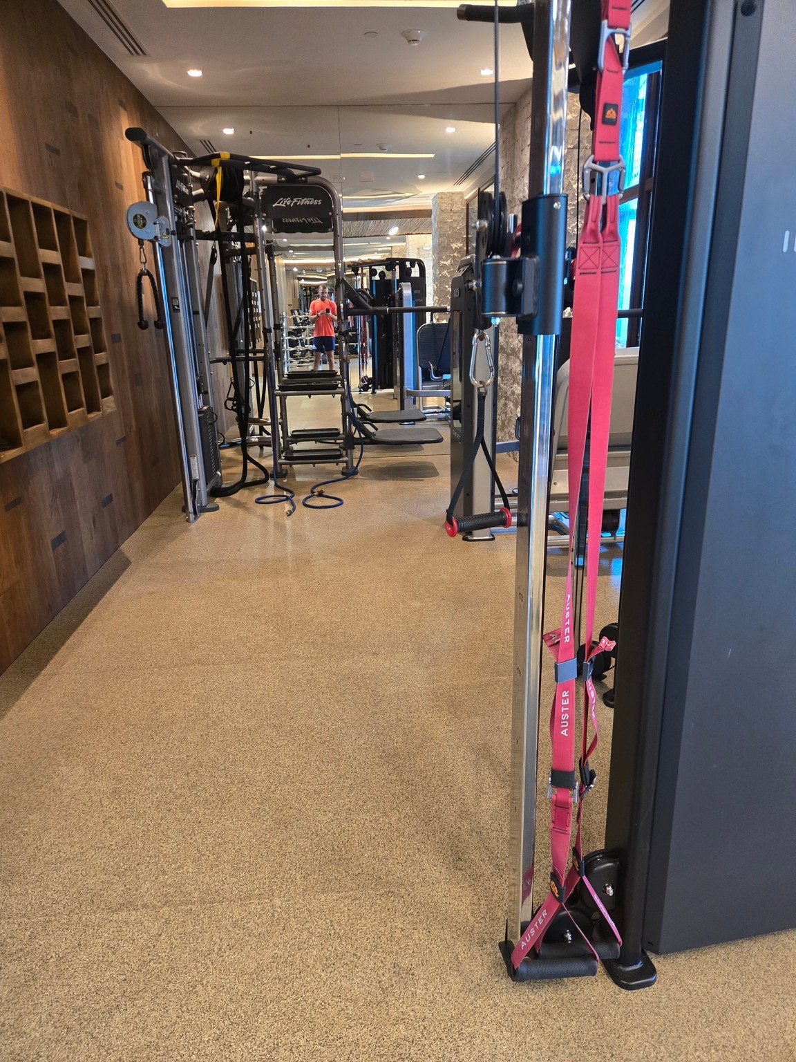 a gym with equipment in the background